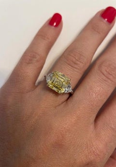 GIA Certified 3 Carat Fancy Intense Yellow Diamond Three-Stone Ring