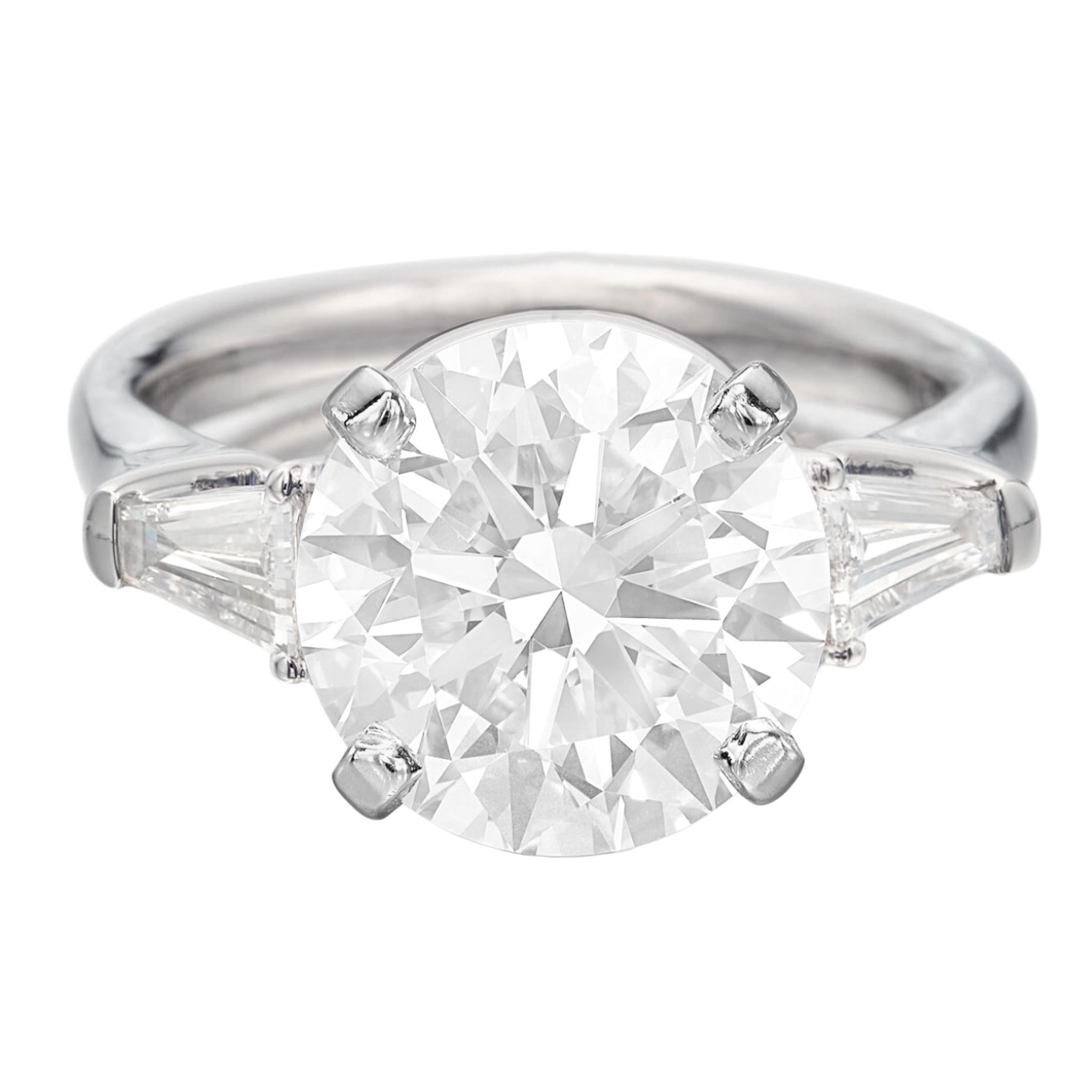 Contemporary GIA Certifield 5 Carat Round Brilliant Cut Diamond Ring with tapered baguette For Sale