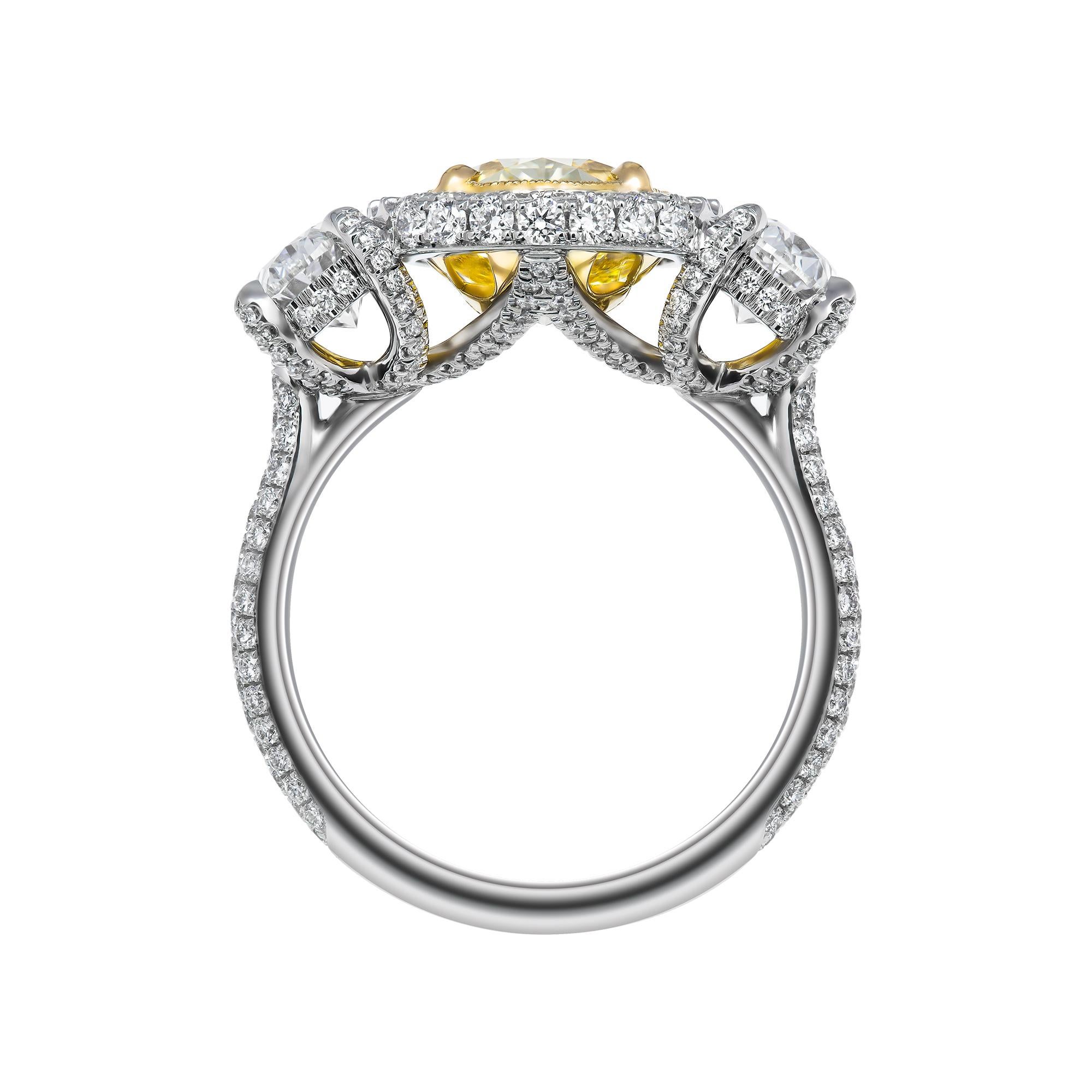 Oval Cut GIA Certifies 3-Stone Ring with 3.52 Carat Fancy Light Yellow Oval Diamond For Sale