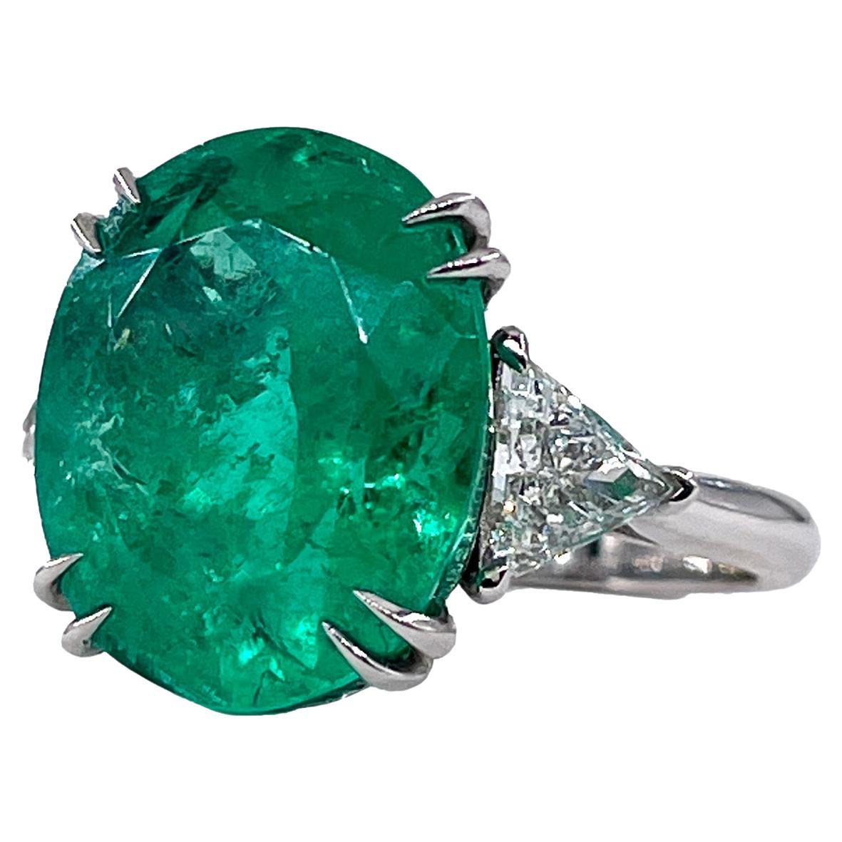 Incredible Gem and Phenomenal deal! Three Stone Engagement Anniversary Ring with GIA 9.76ct Colombian Oval Green Emerald & Diamonds.

This jewel will make a great addition to any GEM/jewelry collection... It is rear to find an emerald over 3ct size,
