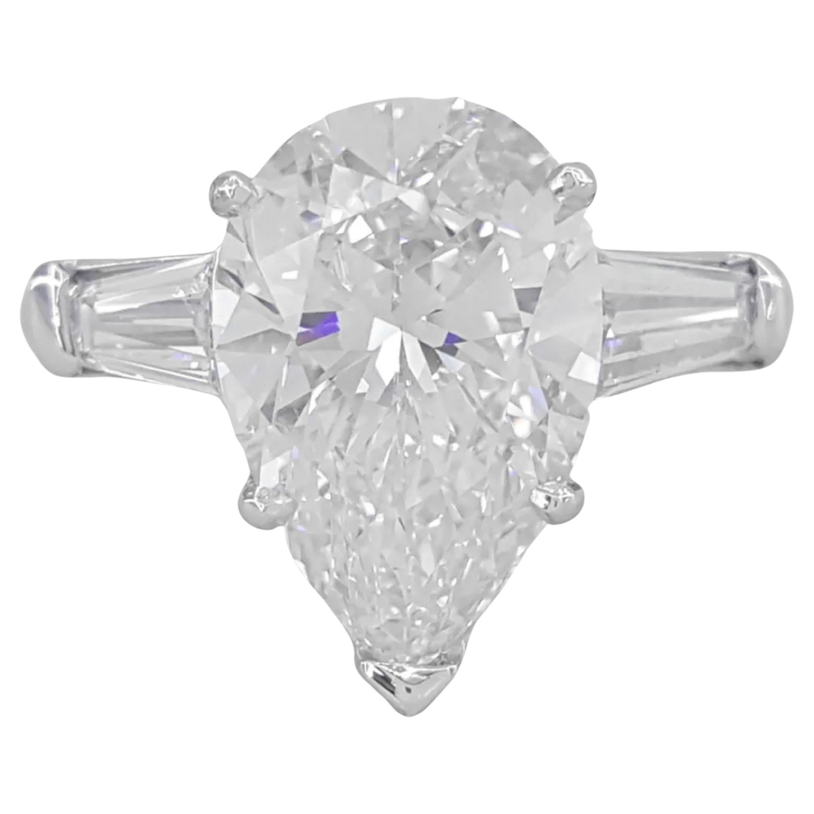 GIA Ct. 4.24 ct Total Weight Pear Cut Diamond ring