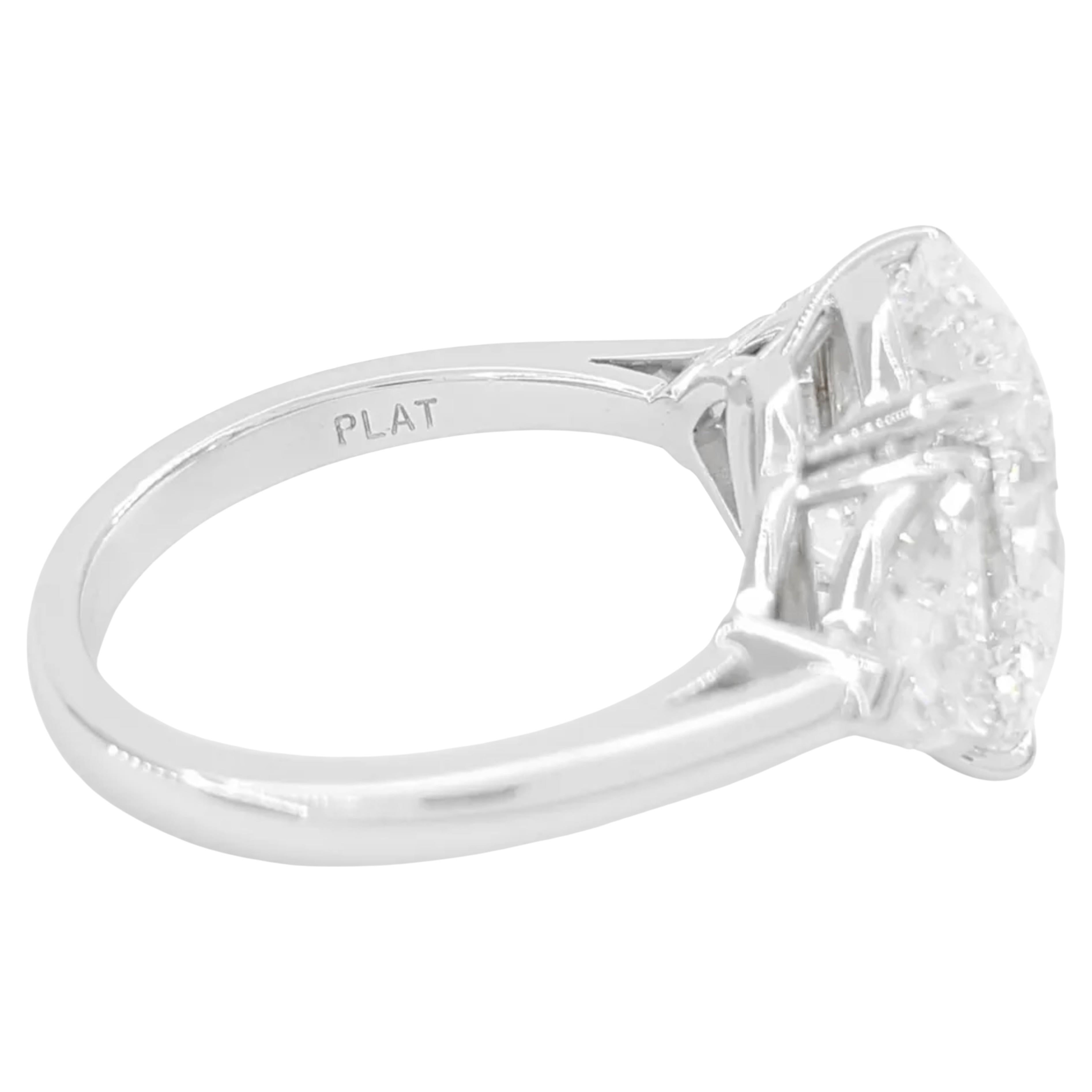 6.56 ct Total Weight Oval Brilliant & Cadillac Cut Diamond three-stone engagement ring is an exquisite piece crafted in platinum. The centerpiece is a stunning 5.29 ct natural oval brilliant cut diamond that boasts an E color grade and VVS1 clarity,