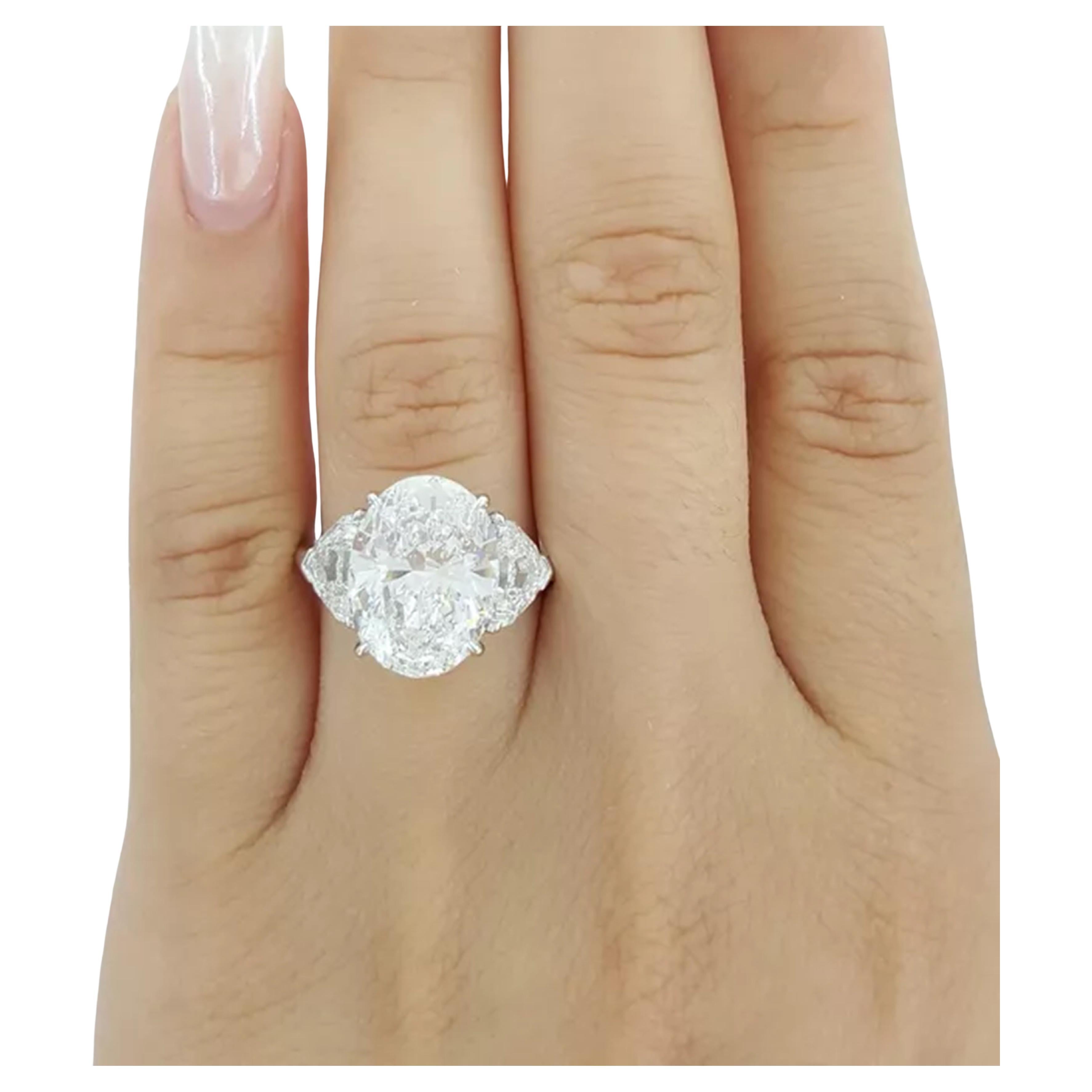 Oval Cut GIA Ct. 6.56 ct Total Weight Oval Brilliant & Cadillac Cut Diamond ring For Sale