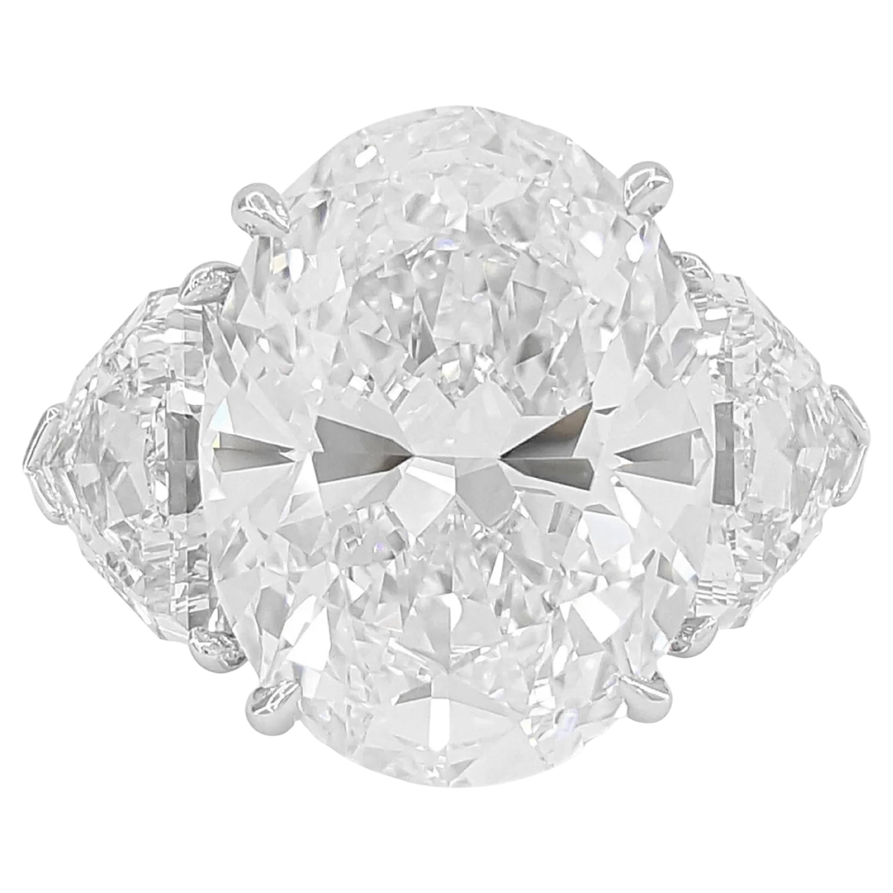 GIA Ct. 6.56 ct Total Weight Oval Brilliant & Cadillac Cut Diamond ring