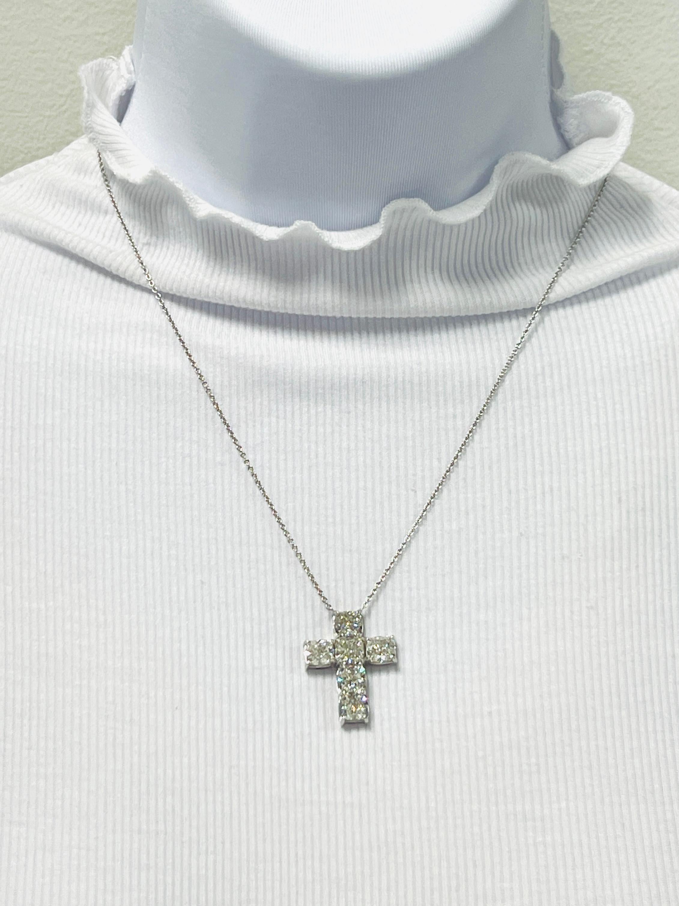 Beautiful 9.06 ct. IJ SI white diamond cushion cuts.  Total of 6 stones, each weighing 1.50 ct.  Handmade in 18k white gold.  Length is 18