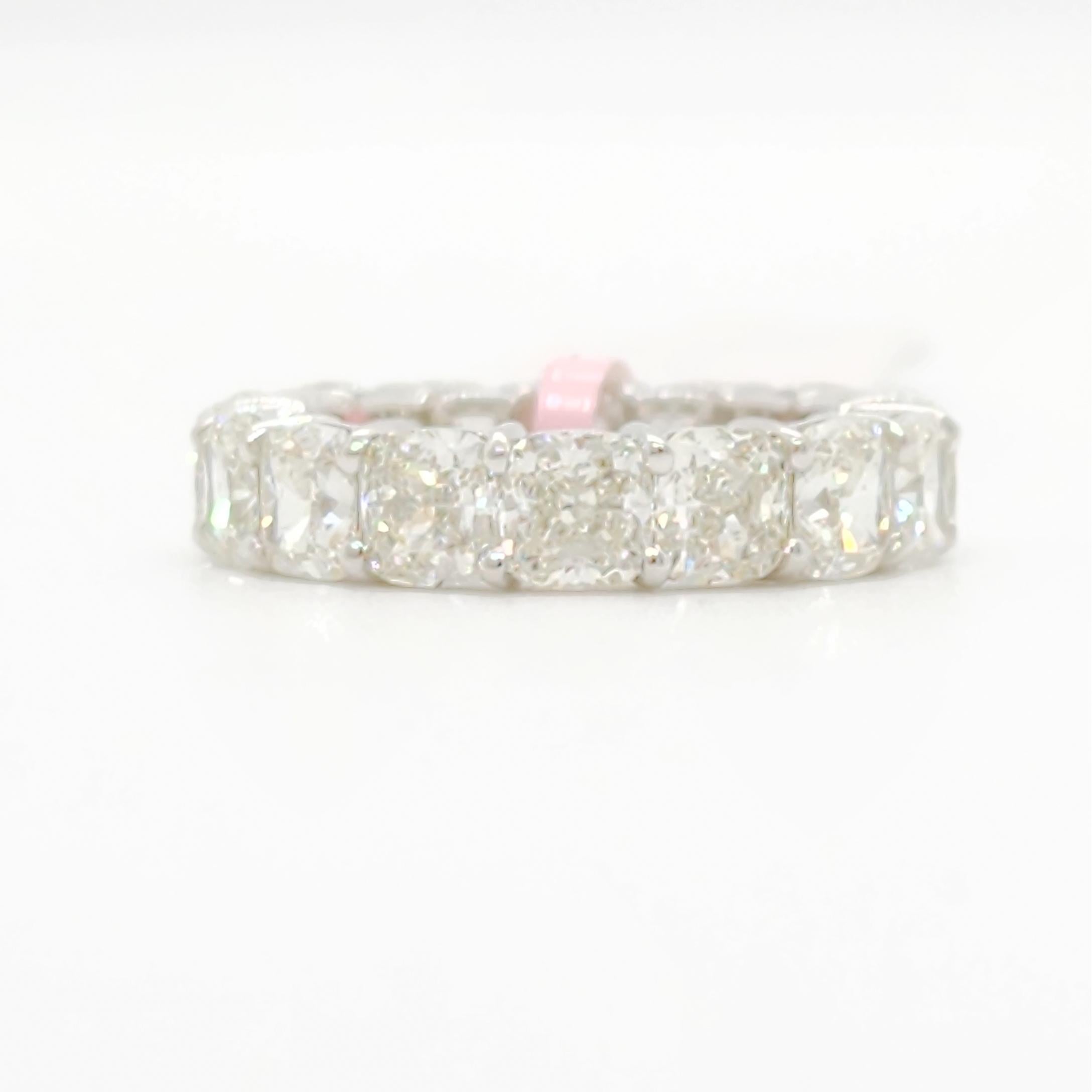 Gorgeous 8.11 ct. cushion cut eternity band with 16 diamonds that are J color and VVS1 to SI1 in clarity.  Handmade in 18k white gold.  All stones are GIA certified.  Ring size 6.5.