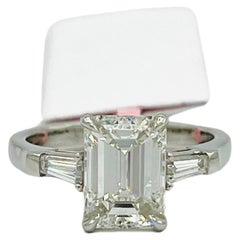 GIA  Emerald Cut White Diamond Three Stone Ring in Platinum