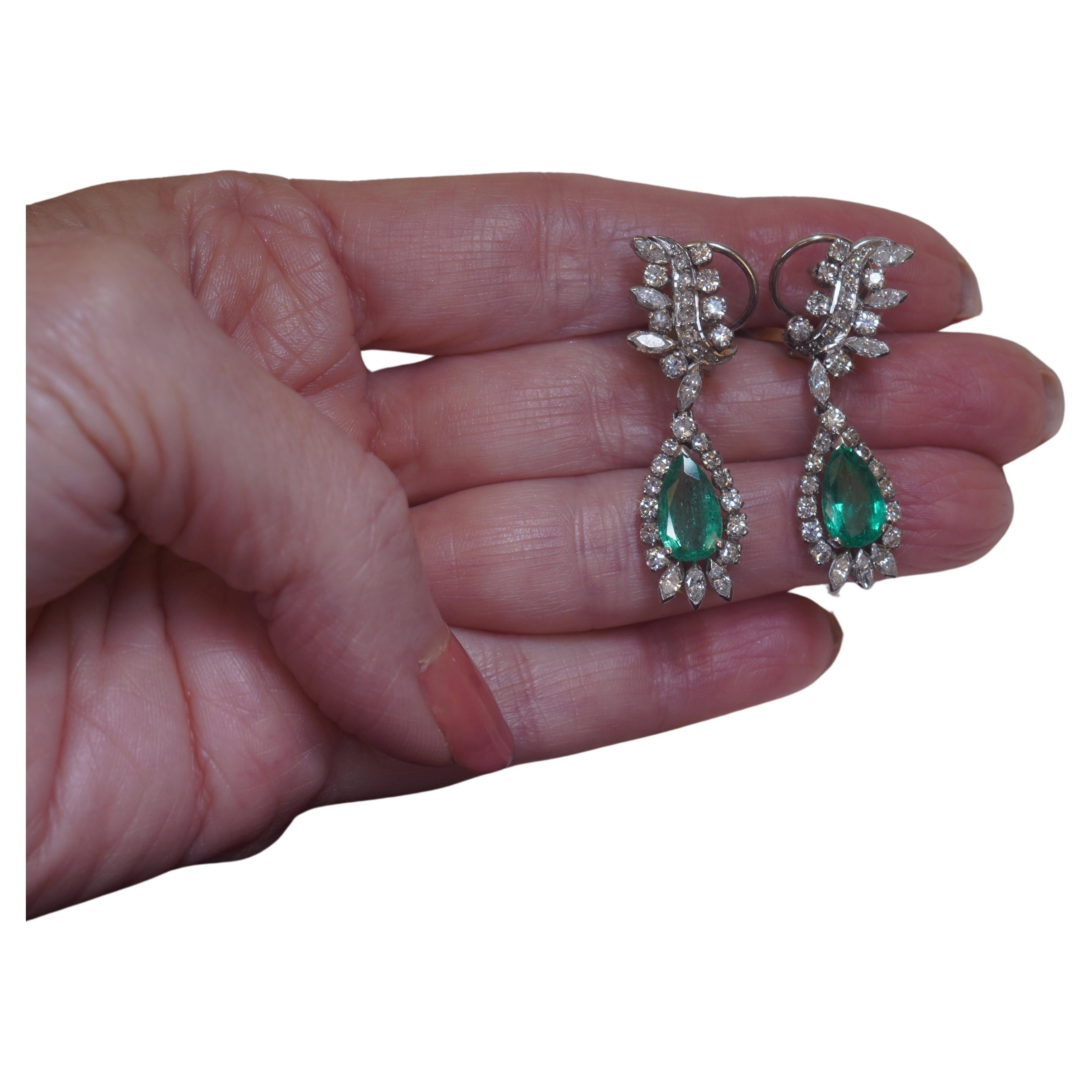 Old South Jewels proudly presents...LUXURY.   ANTIQUE GIA CERTIFIED 7.86 CARAT COLUMBIAN EMERALDS & DIAMOND PLATNUM EARRINGS & BOX!   AAA VIVID GREEN TRANSPARENT COLOMBIAN EMERALDS ARE CROWNED WITH 4.18 CARATS OF SPARKLING WITE DIAMONDS.  FINE