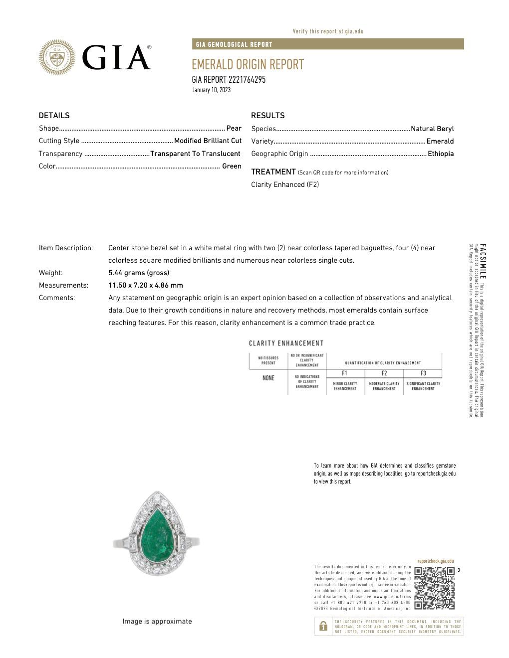 Bague Halo en platine avec diamant émeraude éthiopien taille poire GIA 2