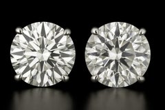 Boucles d'oreilles GIA en diamant rond brillant de 3,94 carats au total