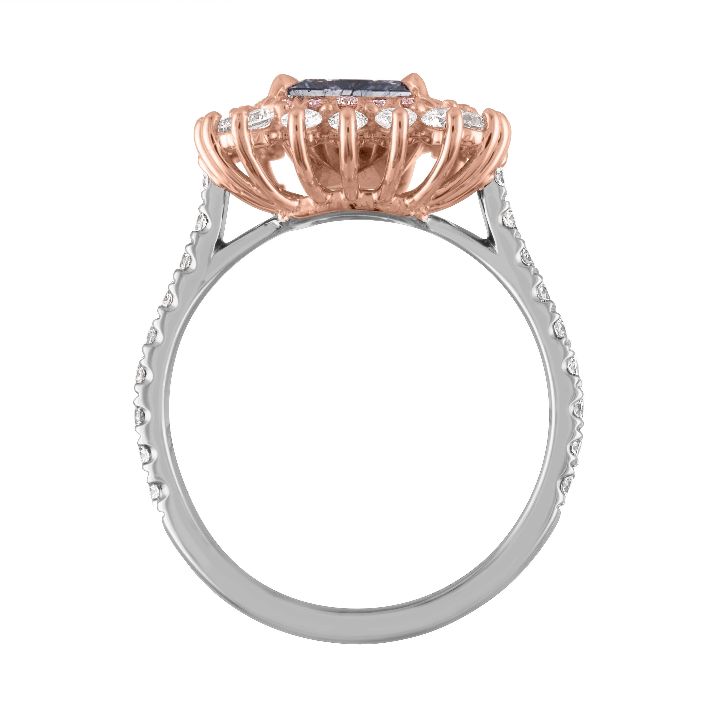 GIA Certified Princess Cut Diamond As Fancy Blue Gray.
GIA Certificate Number is 1176087054
This Princess Cut Diamond is set in Two Tone Mounting, 18K Rose Gold & Platinum. Princess is surrounded with 24 Pink Round Brilliant Diamonds.  The Pink