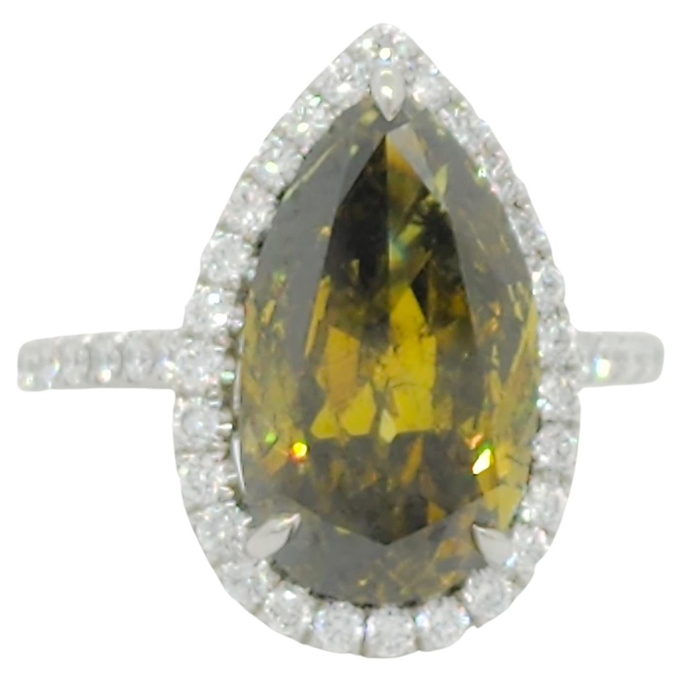 GIA Fancy Deep Brownish Greenish Yellow Pear Shape and White Diamond Ring For Sale