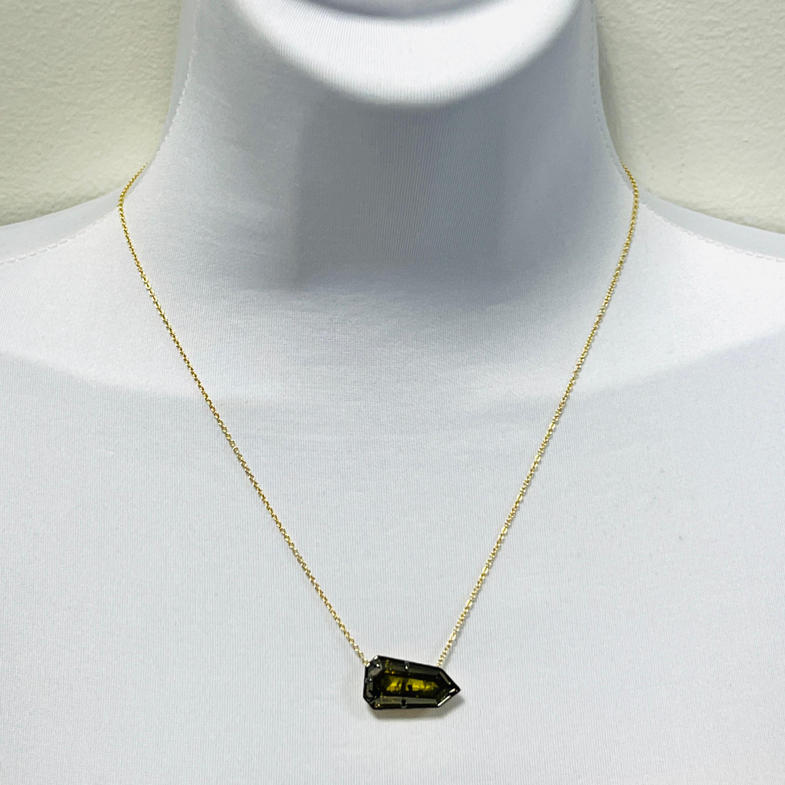 Gorgeous 9.02 ct. Fancy deep brownish greenish yellow diamond shield cut.  Handmade in 18k yellow gold.  Length is 18