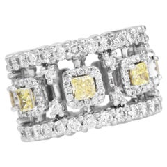 GIA Fancy Intense Yellow 6.60 carat Diamond Platinum Eternity Ring