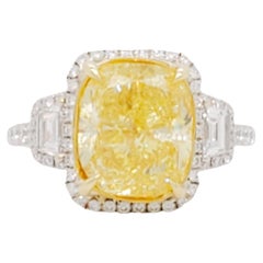 GIA Fancy Intense Yellow Diamond Cushion and White Diamond Cocktail Ring