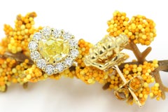 GIA Fancy Intense Yellow Diamond Heart Shape 3.88 CTW Earrings 18K Yellow Gold