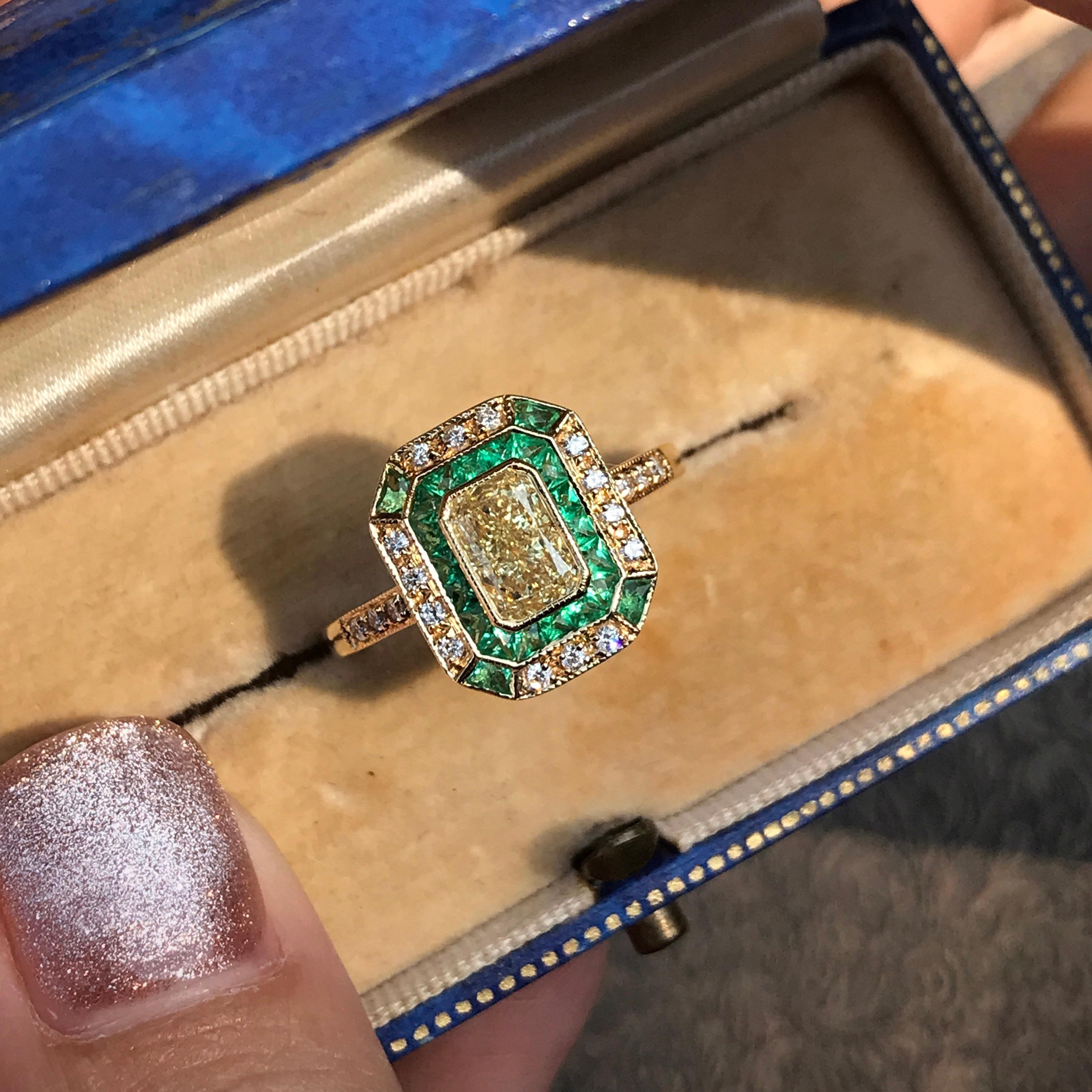 Women's GIA Fancy Light Yellow Diamond with Emerald and Diamond Halo Art Deco Style Ring For Sale