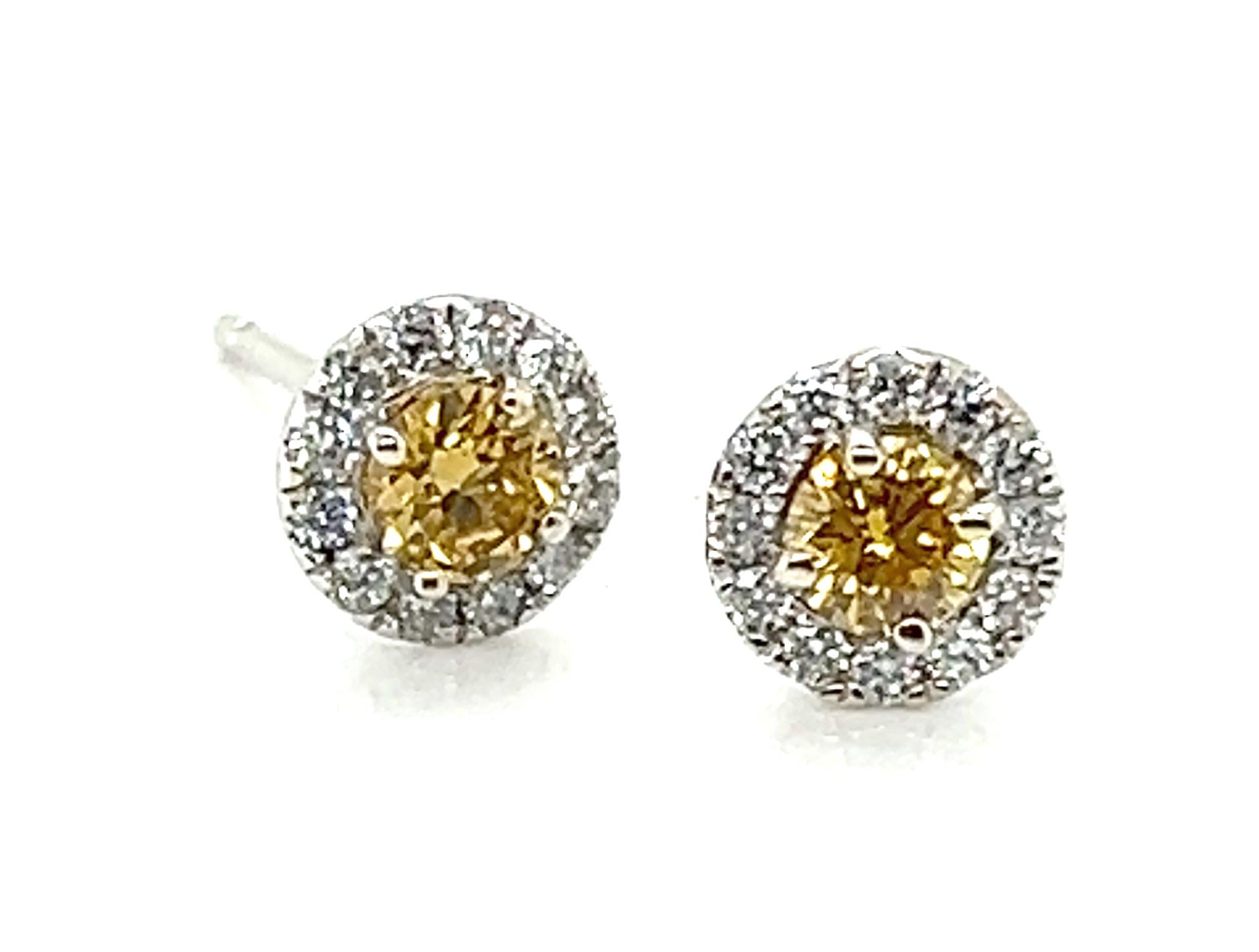 GIA Fancy Orangy Yellow Diamond Halo Stud Earrings .83ct Round Brilliant Brand New 14K


Featuring Two Glamorous Genuine GIA Certified Fancy Brownish Orangy Yellow Round Brilliant Cut Diamond 

Halo Earrings Flaunts Mesmerizing Round-Cut Prong-Set