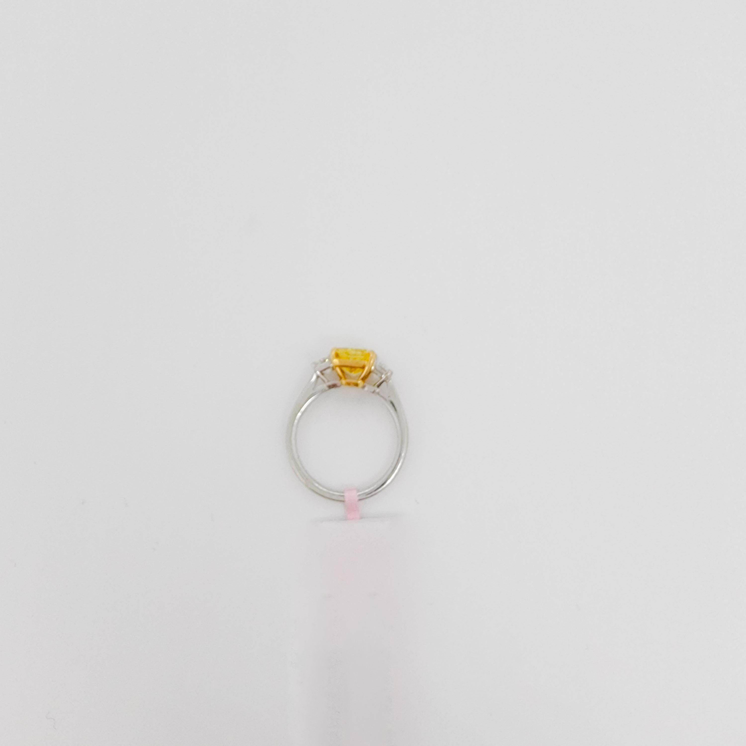 GIA Fancy Vivid Yellow Radiant and White Diamond Three Stone Ring in 18k  1