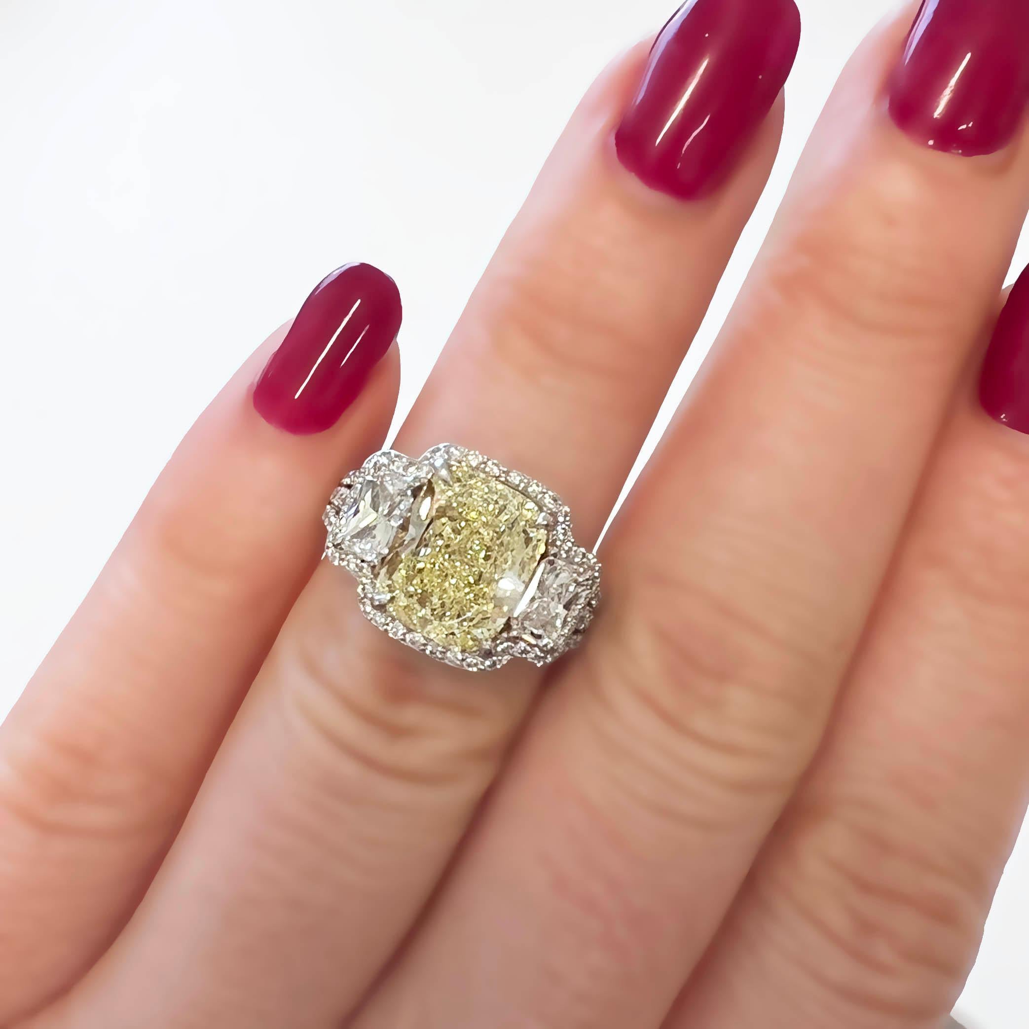GIA Fancy Yellow 4.04 Carat Cushion-Cut Diamond 3-Stone Engagement Ring In Excellent Condition For Sale In Beverly Hills, CA