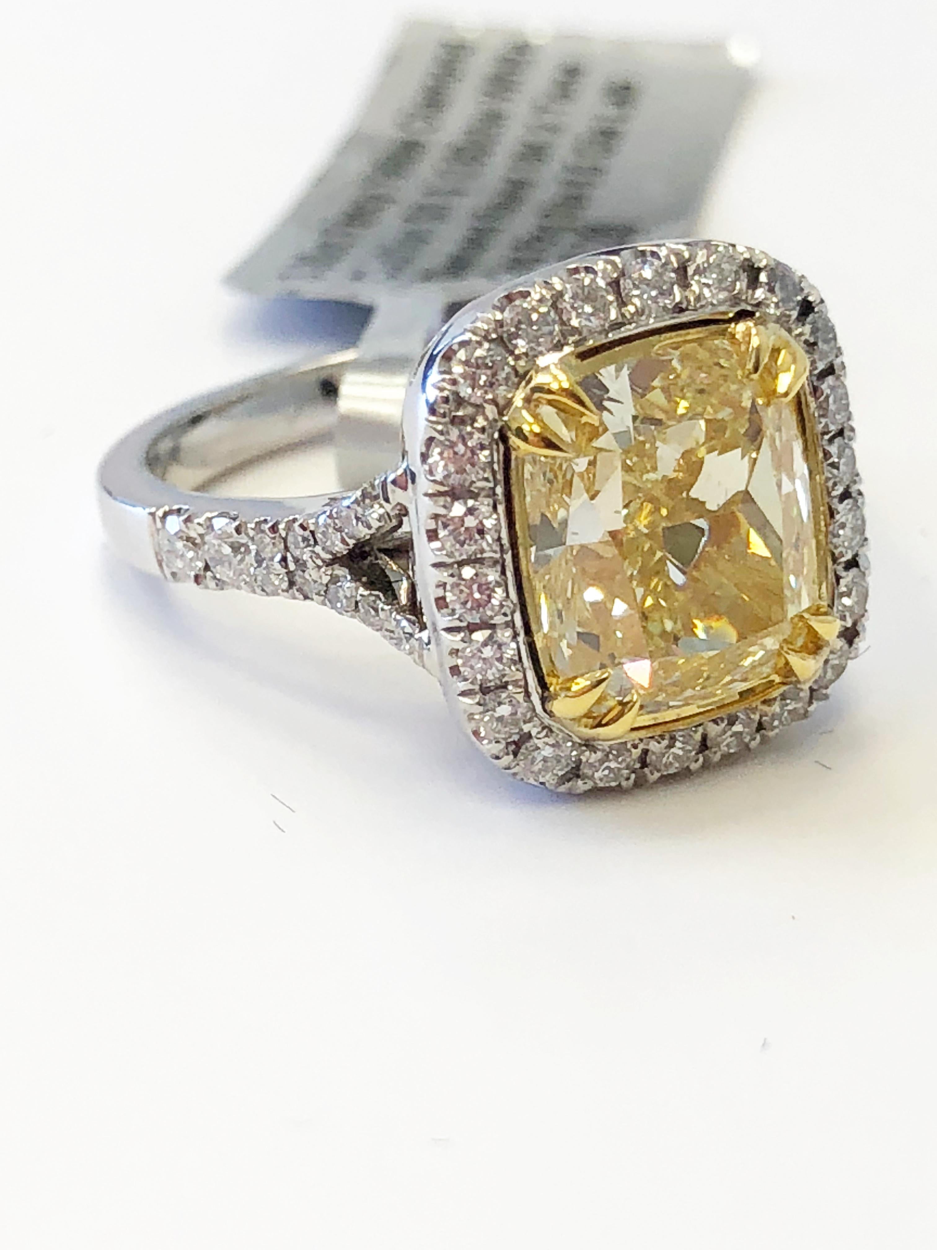 Women's or Men's GIA Fancy Yellow Cushion Diamond and White Diamond Round Engagement Ring