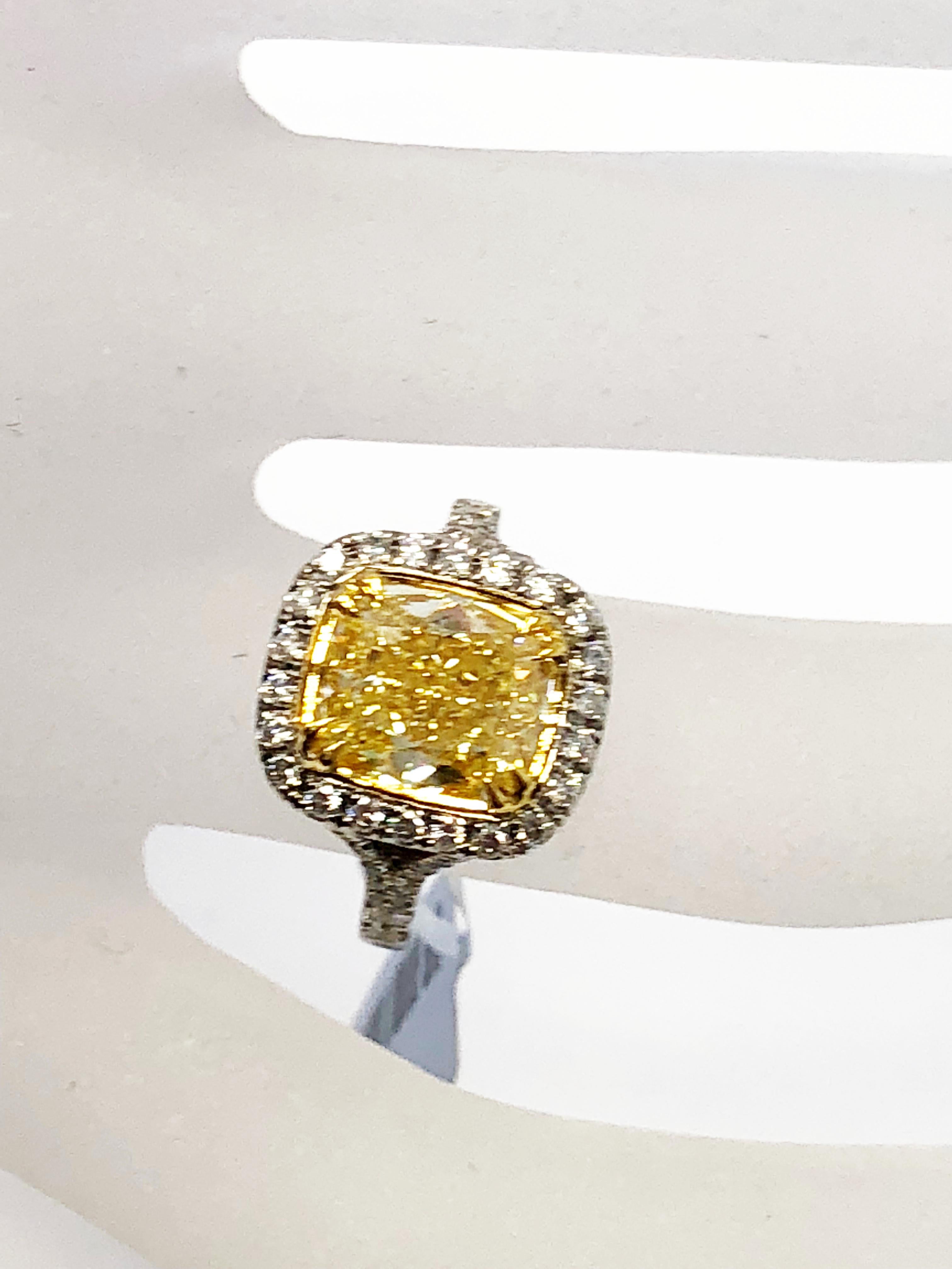 GIA Fancy Yellow Cushion Diamond and White Diamond Round Engagement Ring 1