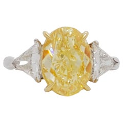 GIA Fancy Yellow Diamond and White Diamond 3 Stone Ring in 14k Two Tone Gold