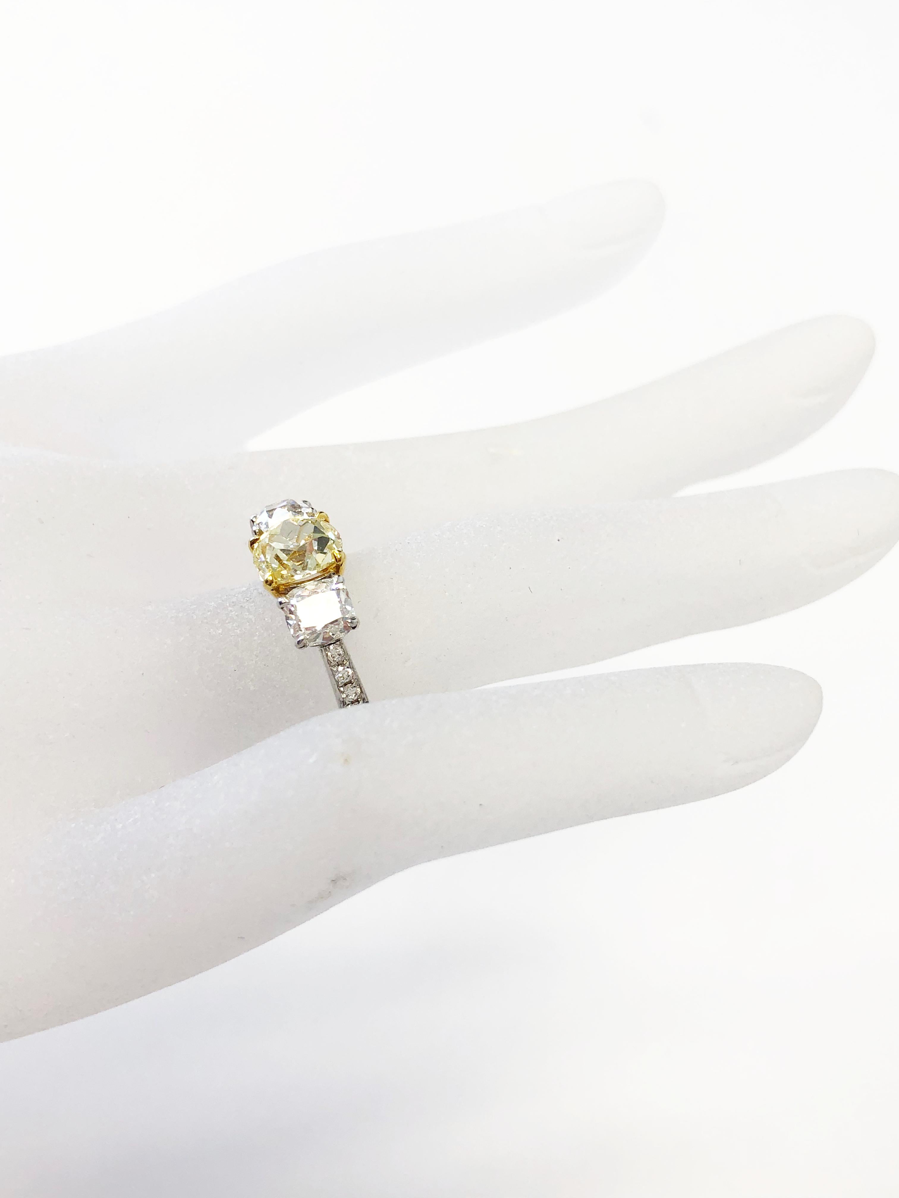 GIA Fancy Yellow Diamond Cushion and White Diamond 3 Stone Ring in 18k Gold  In New Condition In Los Angeles, CA