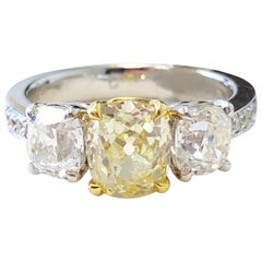 GIA Fancy Yellow Diamond Cushion and White Diamond 3 Stone Ring in 18k Gold