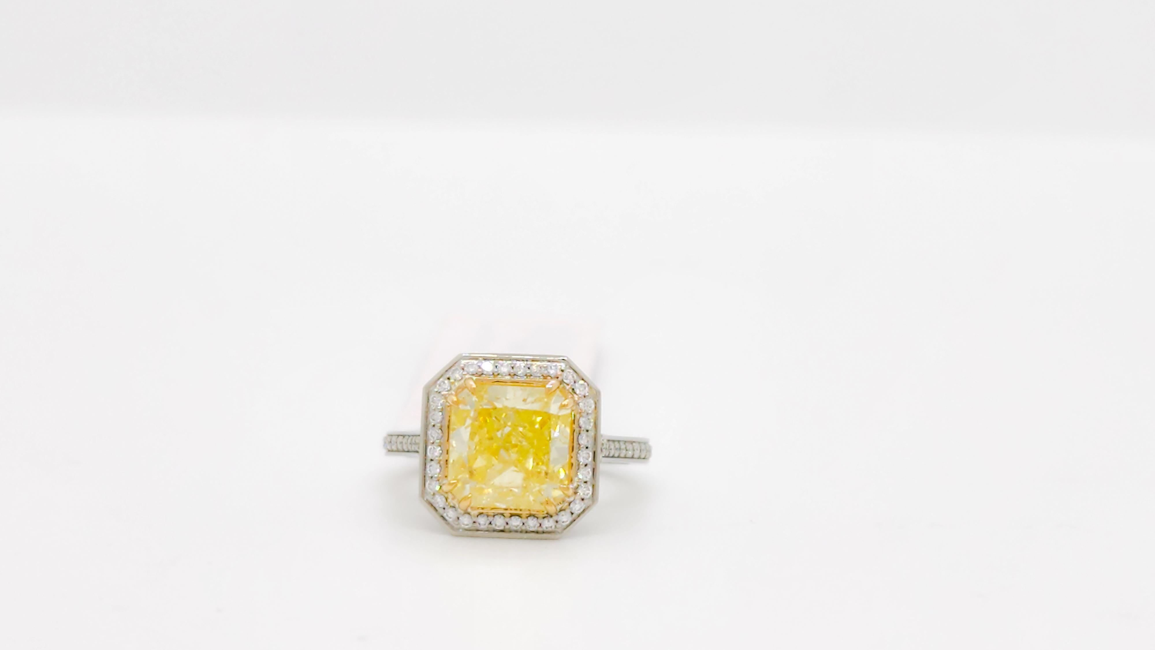 GIA Fancy Yellow Radiant and White Diamond Ring in 18k For Sale 3