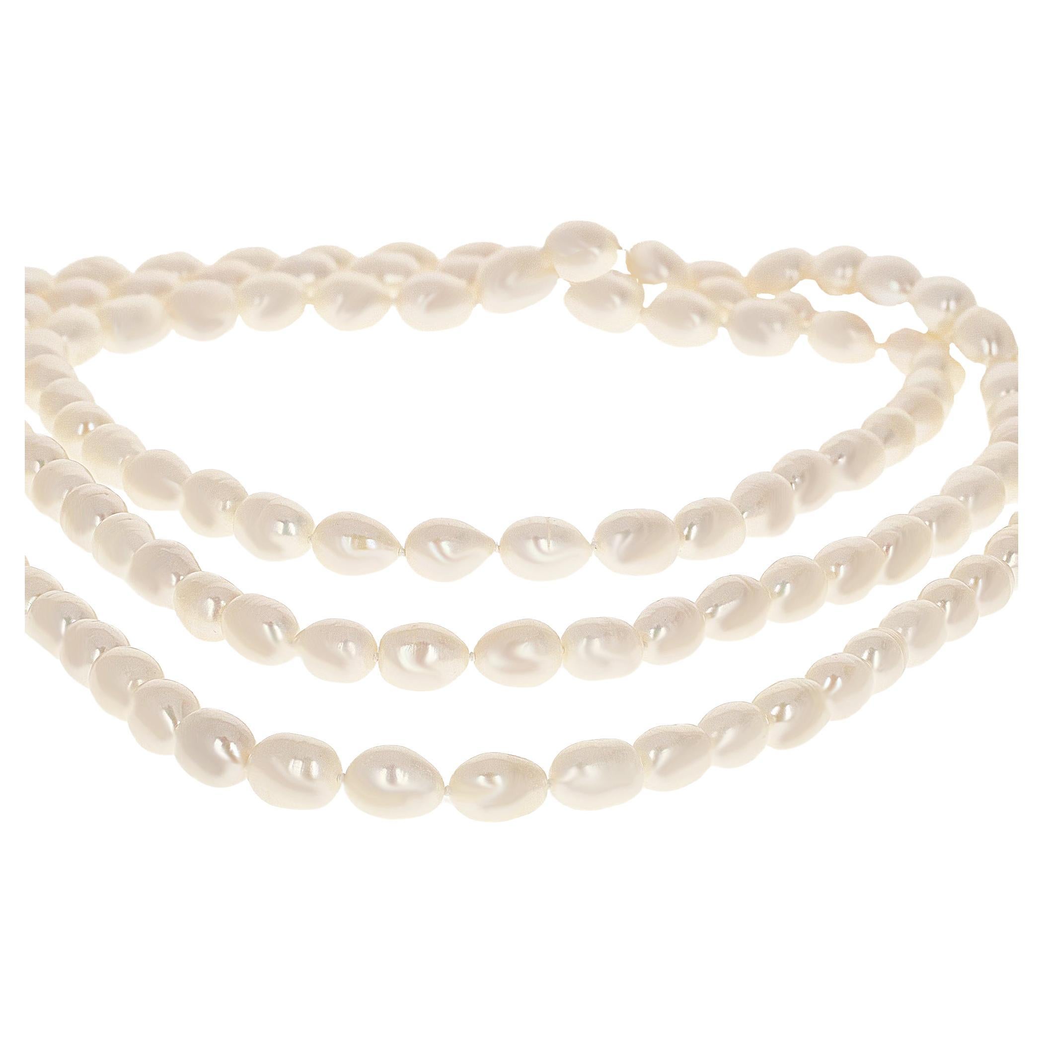 GIA certified, natural freshwater cultured pearls. The strand of pearls is 60 inches long, equal to four single strands.  These stunning pearls measure in size from 12 mm to 15.5 mm. 
Freshwater pearls are unique in size, shape, and color.