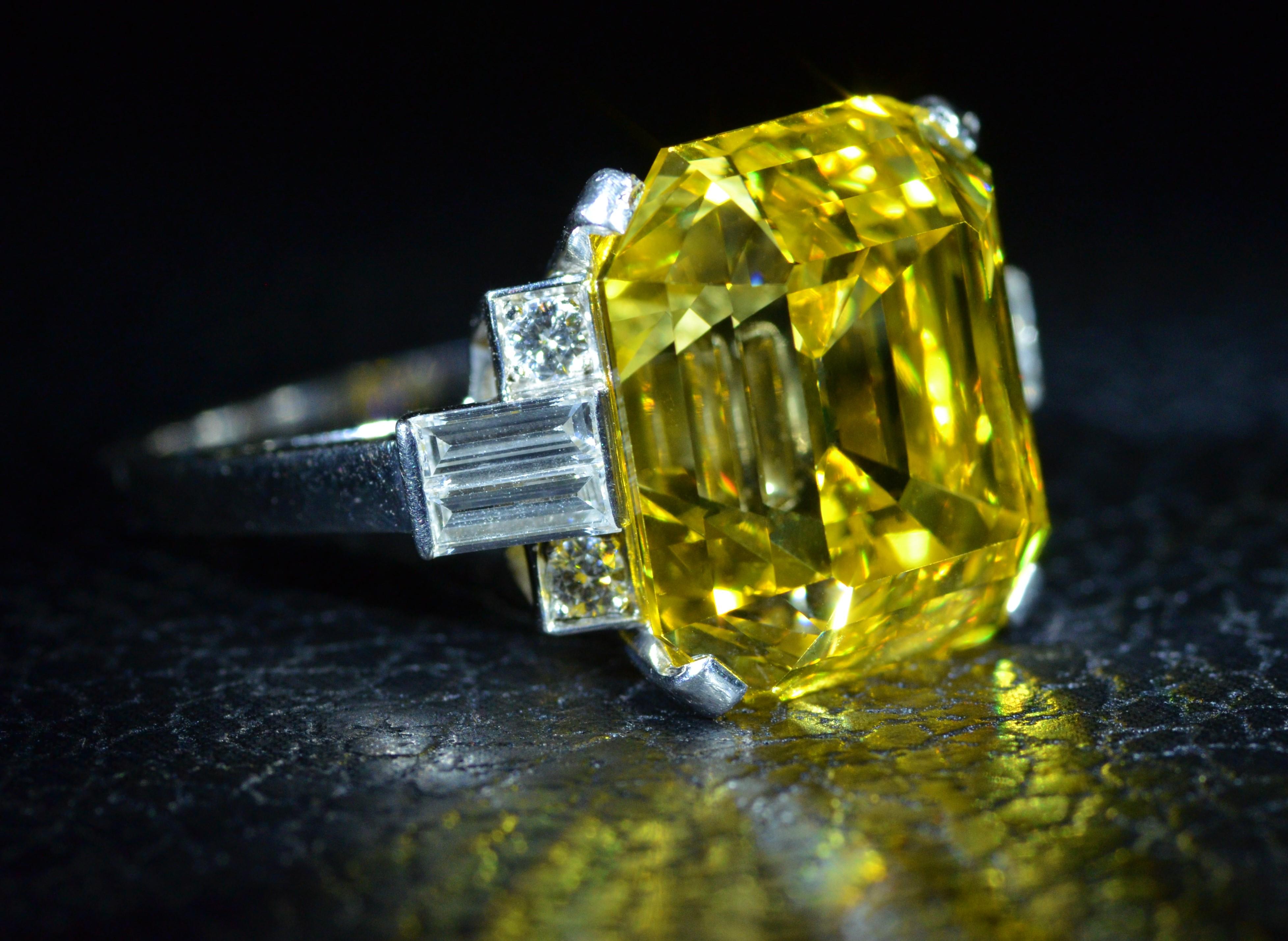 Art Deco GIA Graded 19.01 Carat Fancy Vivid Orangy Yellow Vs2 Diamond Ring in Platinum For Sale