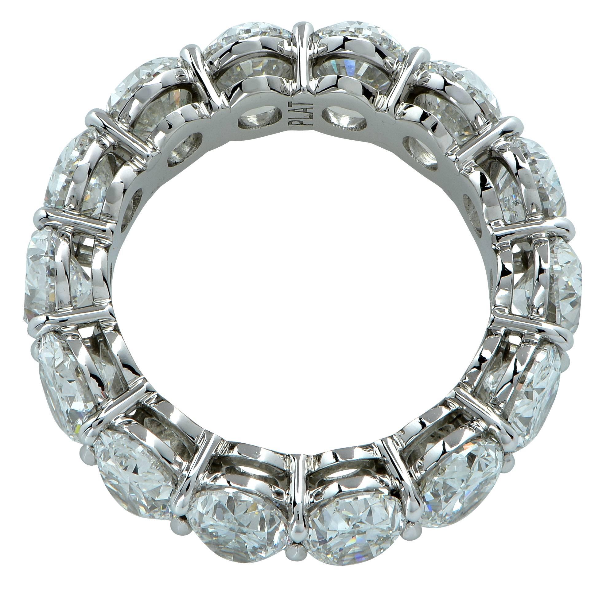 Spectacular eternity band crafted by hand in Platinum showcasing 14 stunning GIA certified Oval Brilliant cut diamonds weighing 9.92 carats total, F-G color, VS2-SI1 clarity. Each diamond is laser inscribed with the GIA report number. The diamonds