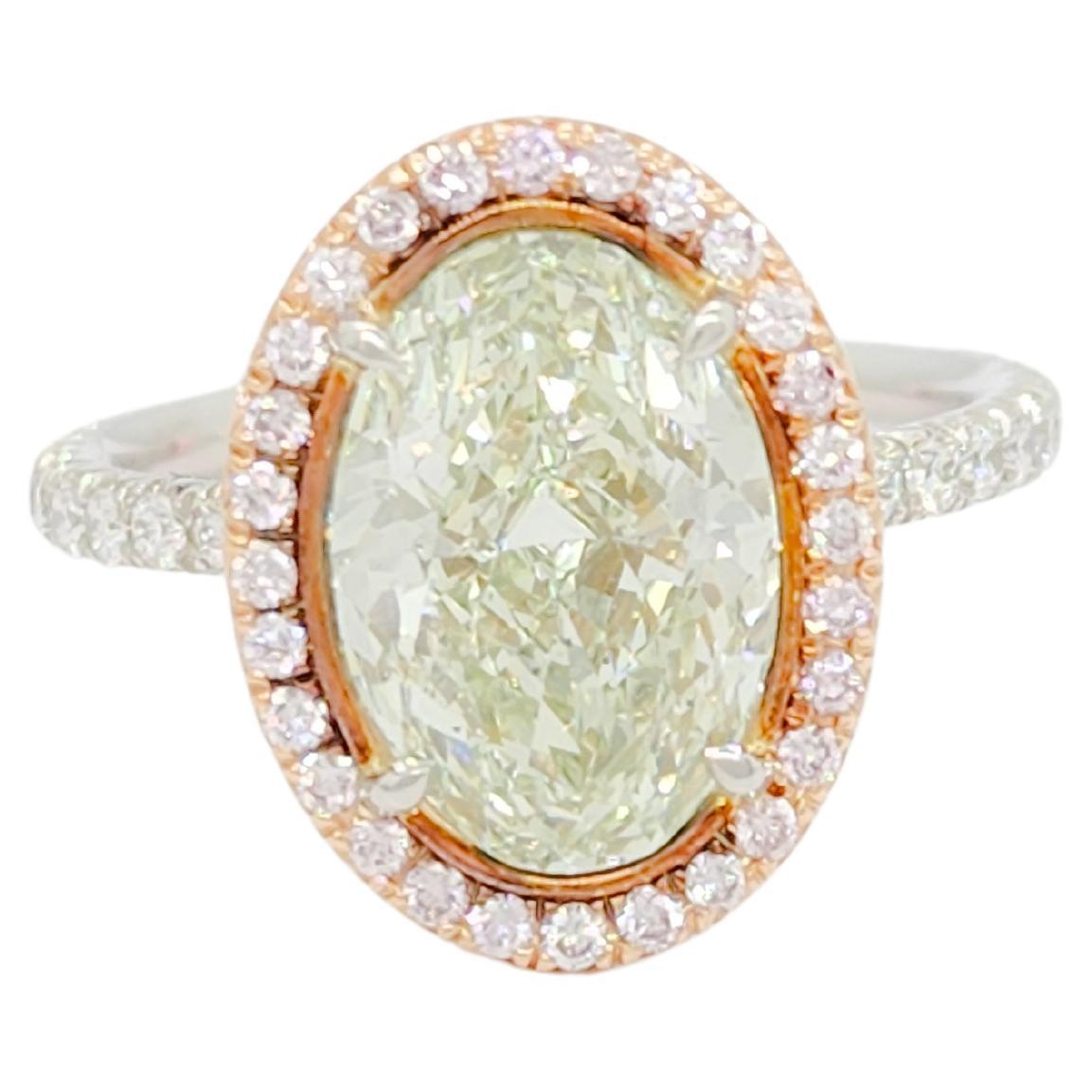 GIA Green Diamond Oval and Pink Diamond Ring in Platinum and 18k Rose Gold For Sale