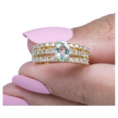 GIA Ring aus 14 Karat Gelbgold mit grünem Paraiba-Turmalin, oval und Diamant