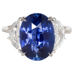 GIA GRS Certified 7 Carat Oval Blue Sapphire Oval Diamond Ring