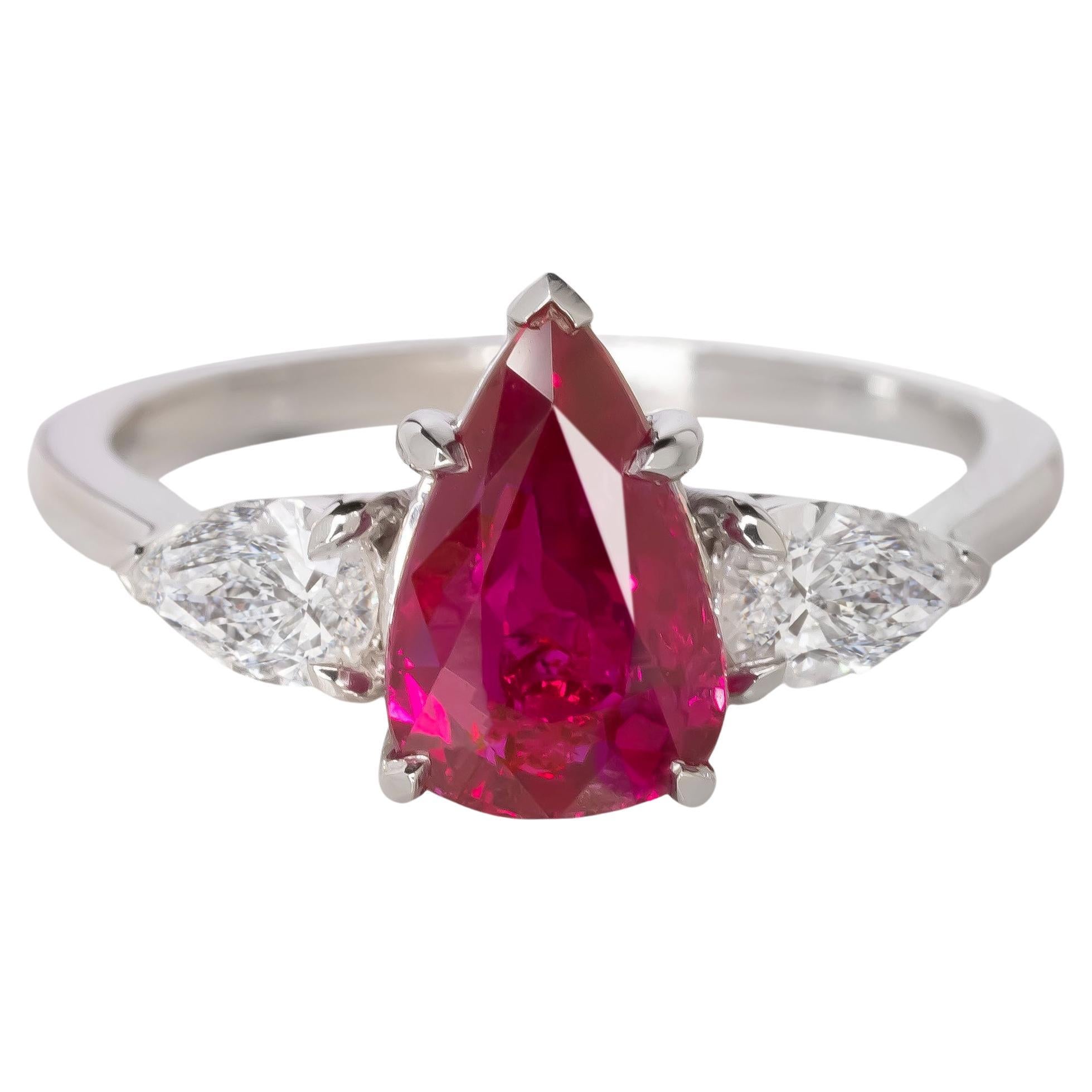 GRS Switzerland Pear Cut Ruby Three Stone Diamond Ring (bague à trois pierres en rubis) en vente