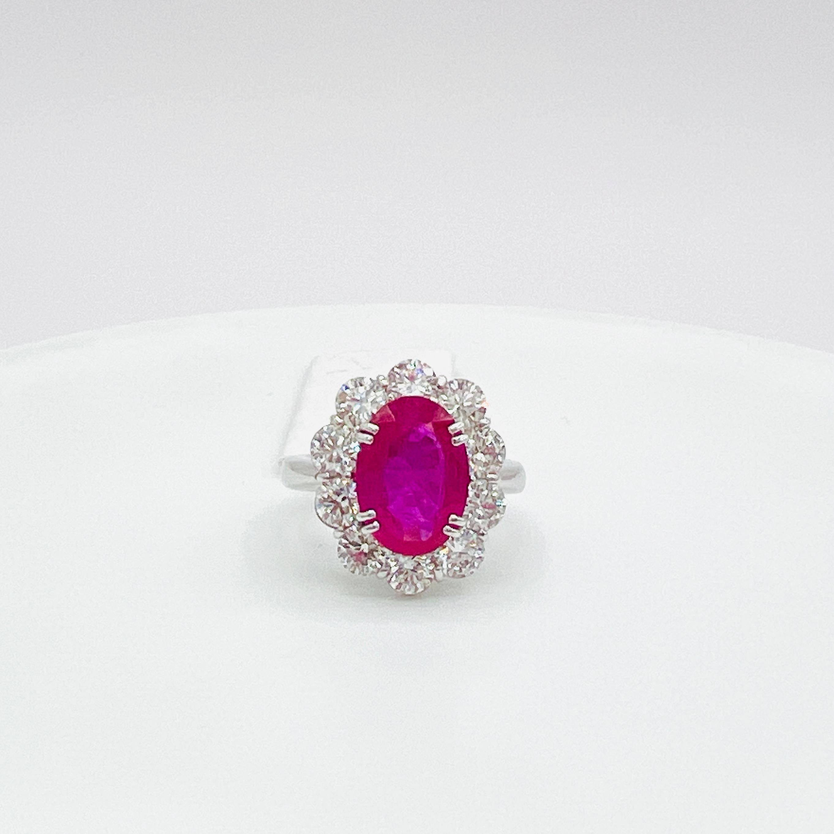 GIA Heated Ruby Oval and White Diamond Round Ring in Platinum