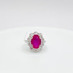 GIA Heated Ruby Oval and White Diamond Round Ring in Platinum