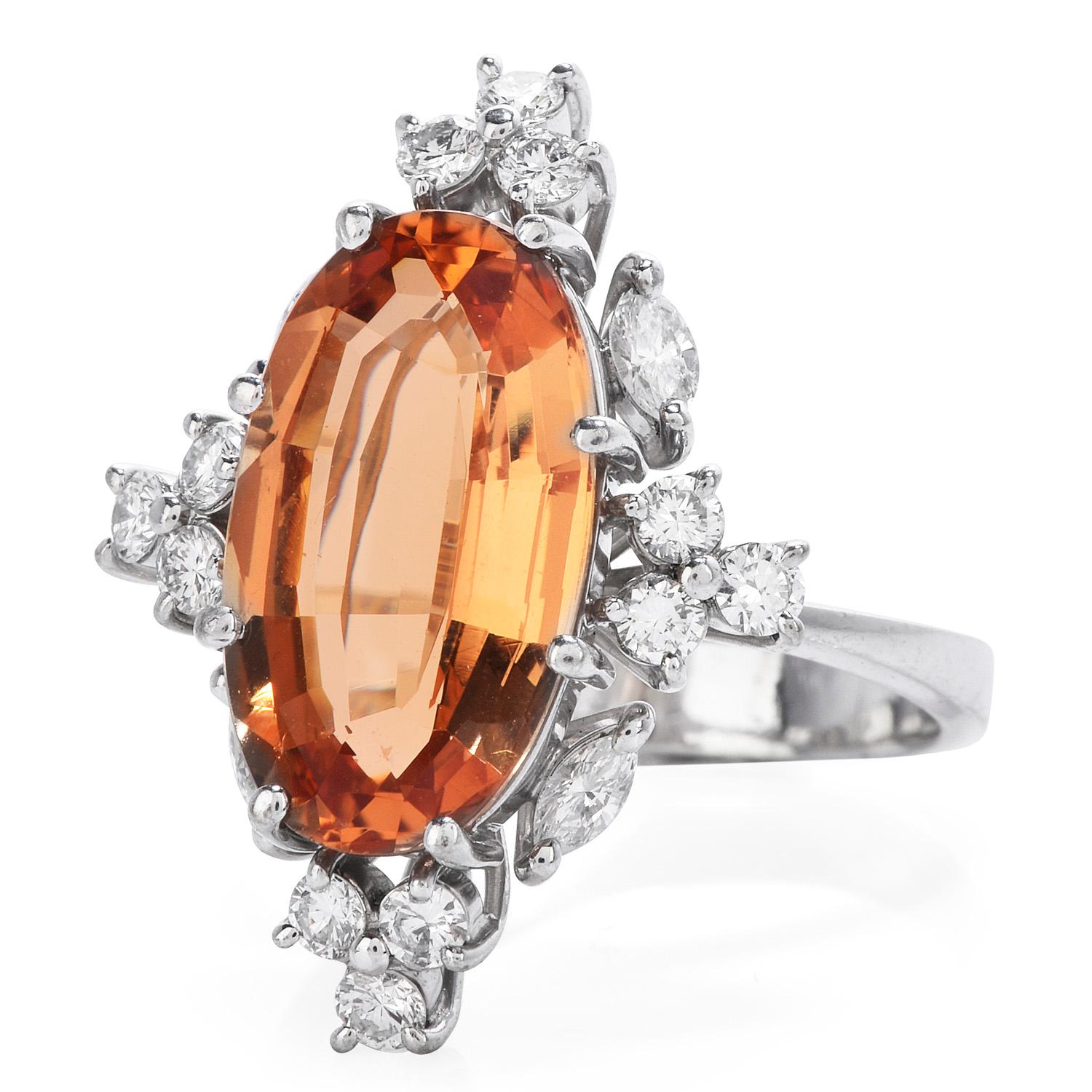This Exquisite GIA Certified Yellowish Orange Imperial Topaz alludes to the color of the sundown 

Exuding femineity with its Victorian-inspired design, the Yellowish Orange Topaz weighs 5.80 carats.

Crafted on 18K white gold it is surrounded with