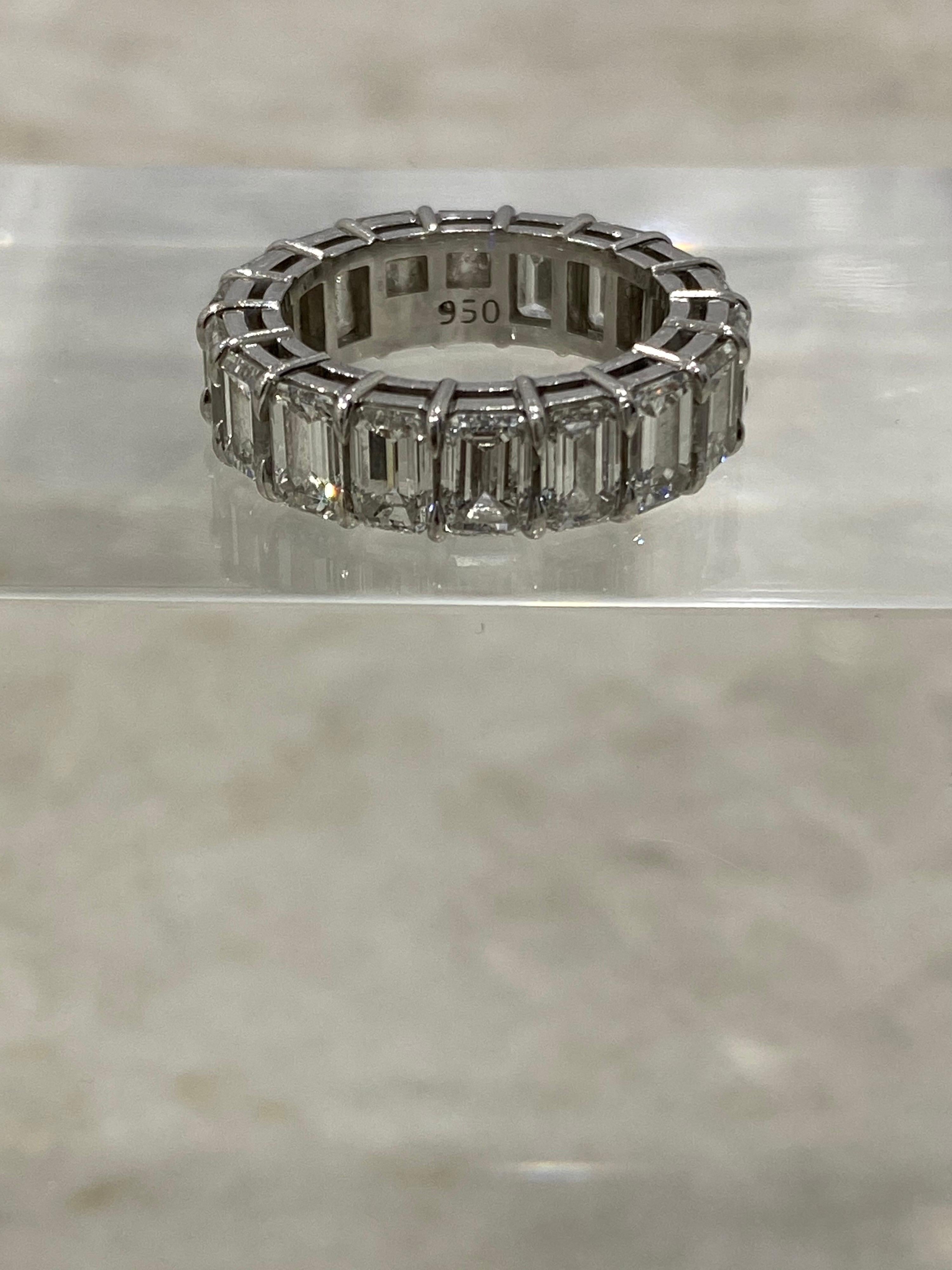 If your looking for a quality, forever style eternity band to cherish for years to come....Just having the diamonds with GIA inscriptions makes this a jewelry purchase that will always be desirable. 
18 emerald cut diamonds set in a custom platinum