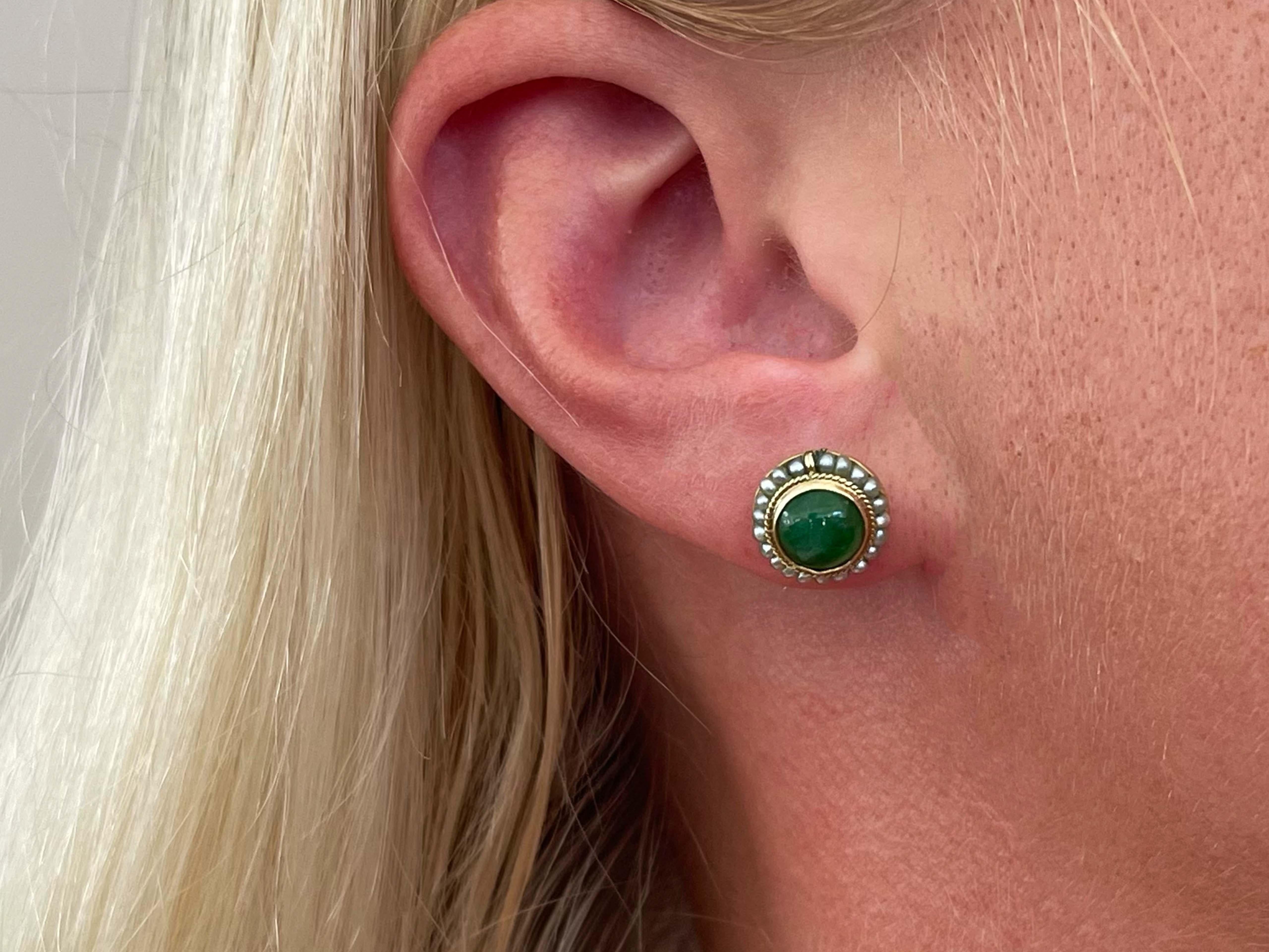Earrings Specifications:
Metal: 14K Yellow Gold

Total Weight: 1.73 Grams
​
​​GIA Report #: 2235035276

Gemstone Species: Jadeite Jade 
​
​Treatment: Natural color, no indications of impregnation
​
​Jade Measurements: 7.20 mm x 7.30 mm x 3.50