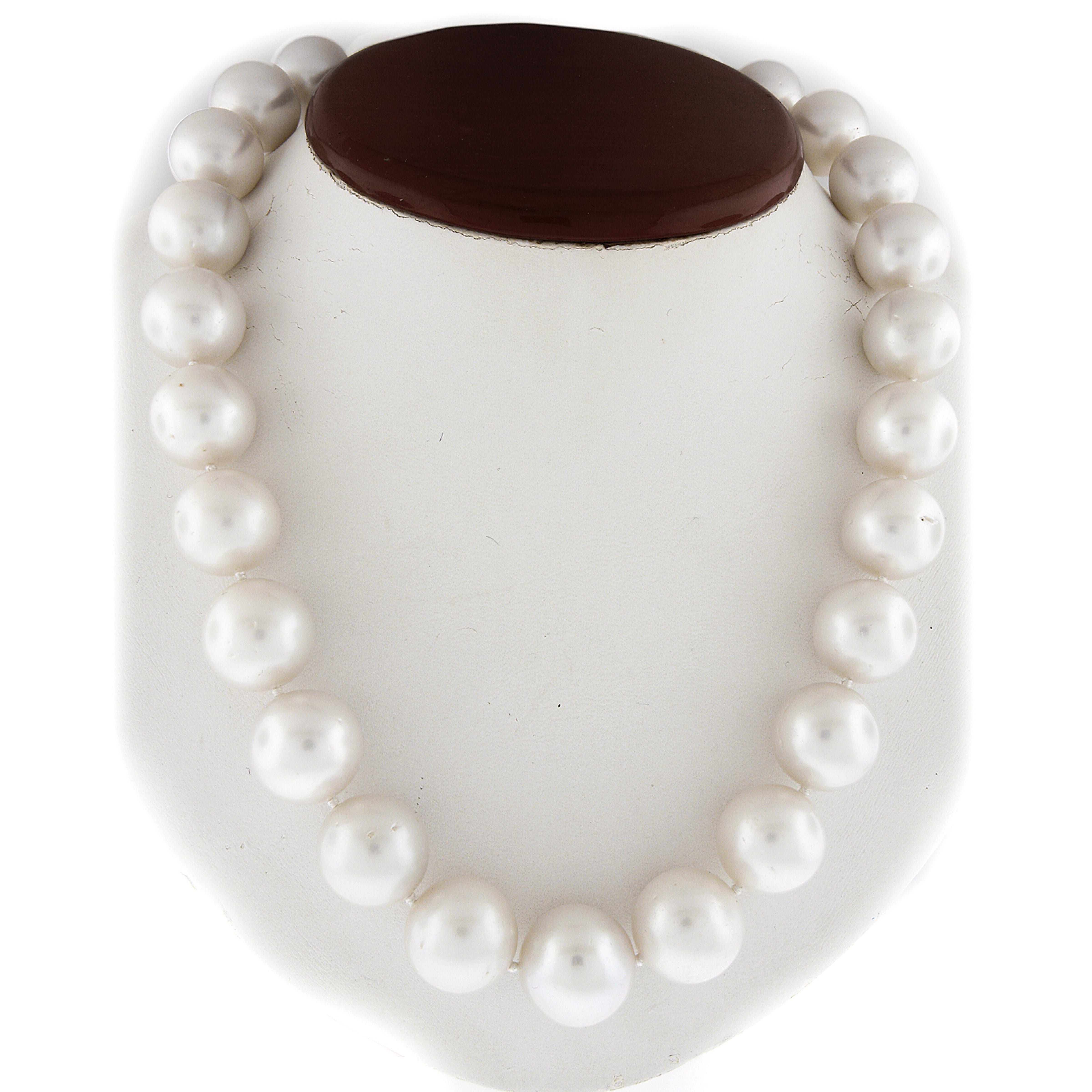 --Stone(s):--
(27) Genuine Cultured South Sea Pearls - Near-Round Beads - White Color - 15mm to 17.42x17.30mm
** See Certification Details Below for Complete Info **
Numerous Natural Genuine Diamonds - Round Brilliant Cut - Burnish Flush Set - G/H