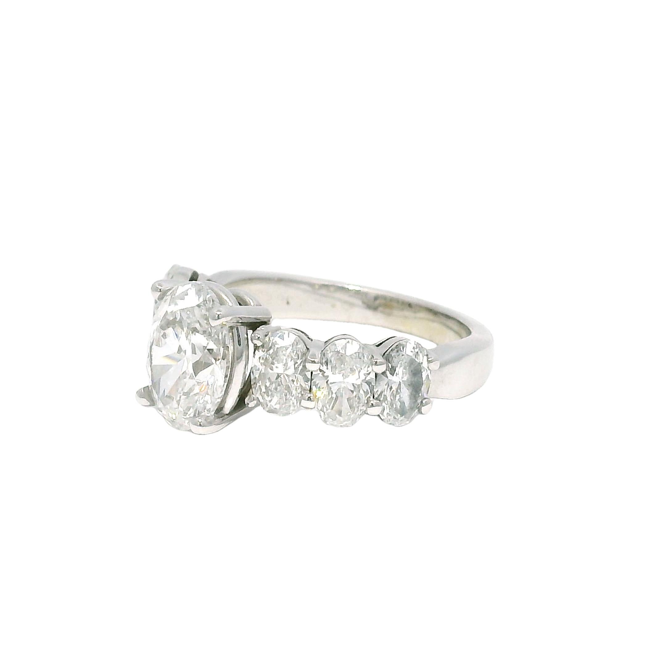 GIA Natural 1.52 Carat Oval Cut Diamond, 7 Stone 18-Karat Ring In Stock In Excellent Condition For Sale In Boca Raton, FL