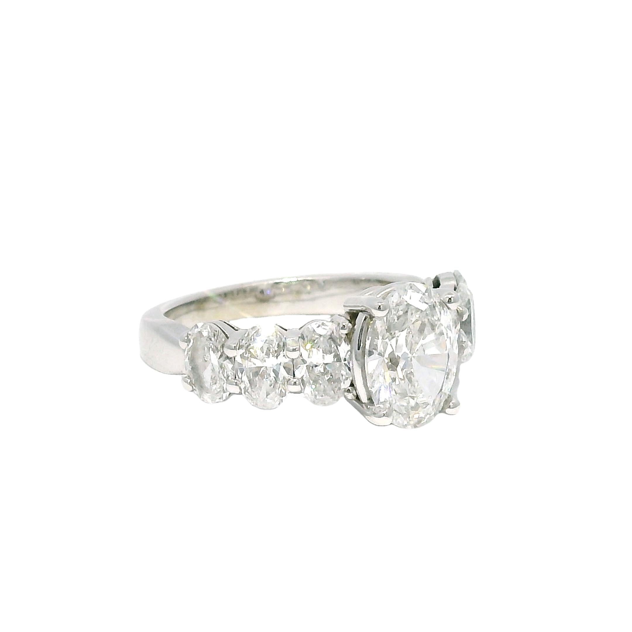 GIA Natural 1.52 Carat Oval Cut Diamond, 7 Stone 18-Karat Ring In Stock For Sale 1