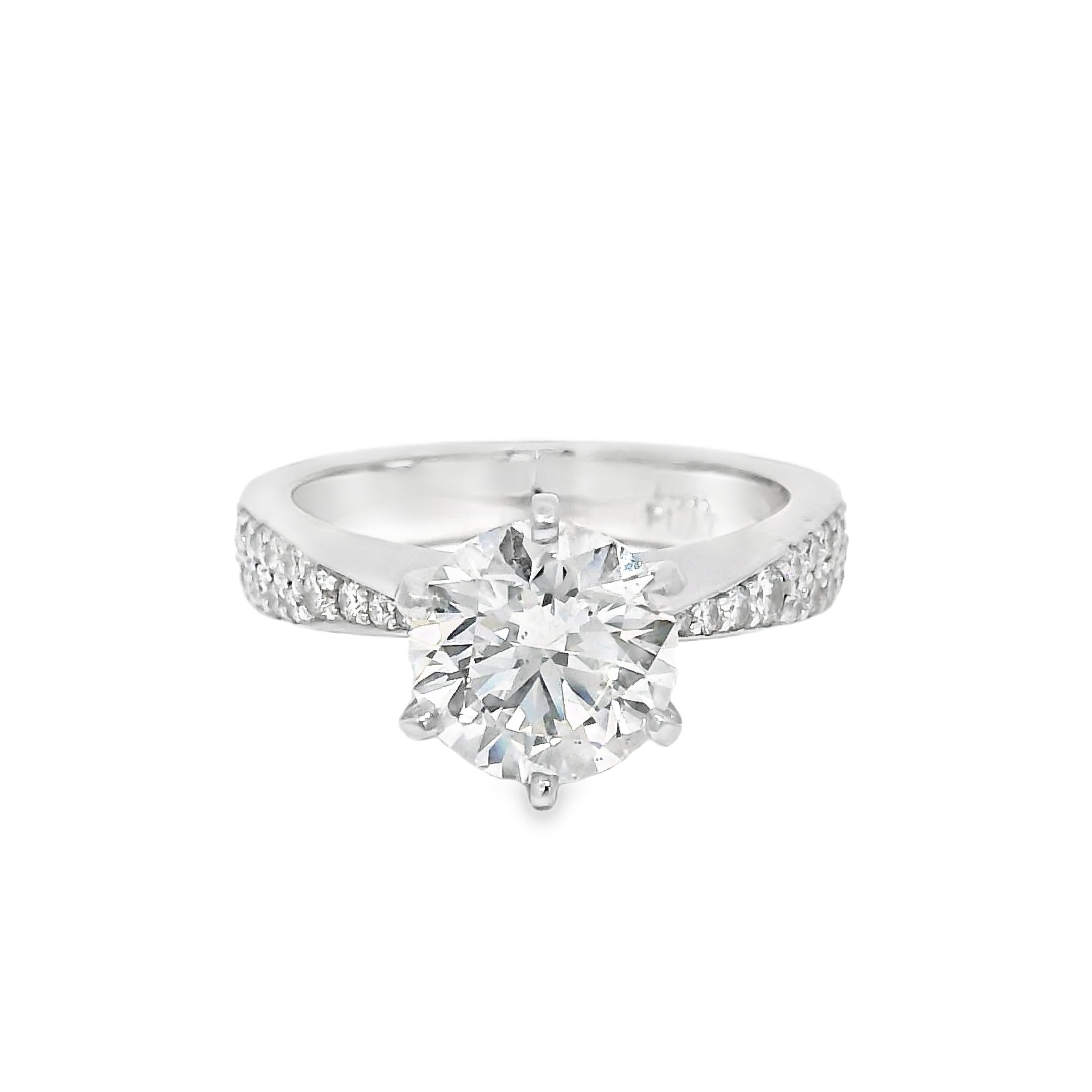 GIA 14k White Gold & Platinum Natural 2.13 Carat Round Brilliant-Cut Diamond Engagement Ring

Material: 14k White Gold (head), Platinum (Mounting)

Main Diamond Details: 
The main diamond is a natural, 2.13-carat Round Brilliant-cut Diamond
The main