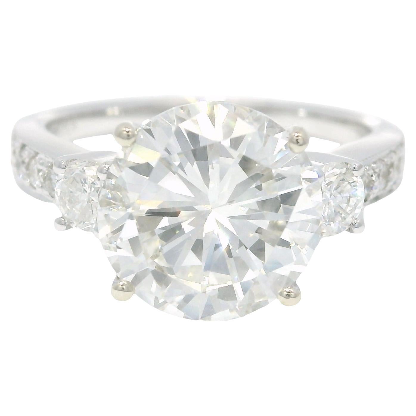 GIA 18k White Gold Natural 3.51 Carat Round Brilliant Diamond Engagement Ring

Style: Round Brilliant Diamond Engagement Ring
Material: 18k White Gold
Main Diamond Details: 
The main diamond is a natural, 3.51 carat, Round Brilliant cut Diamond.
The