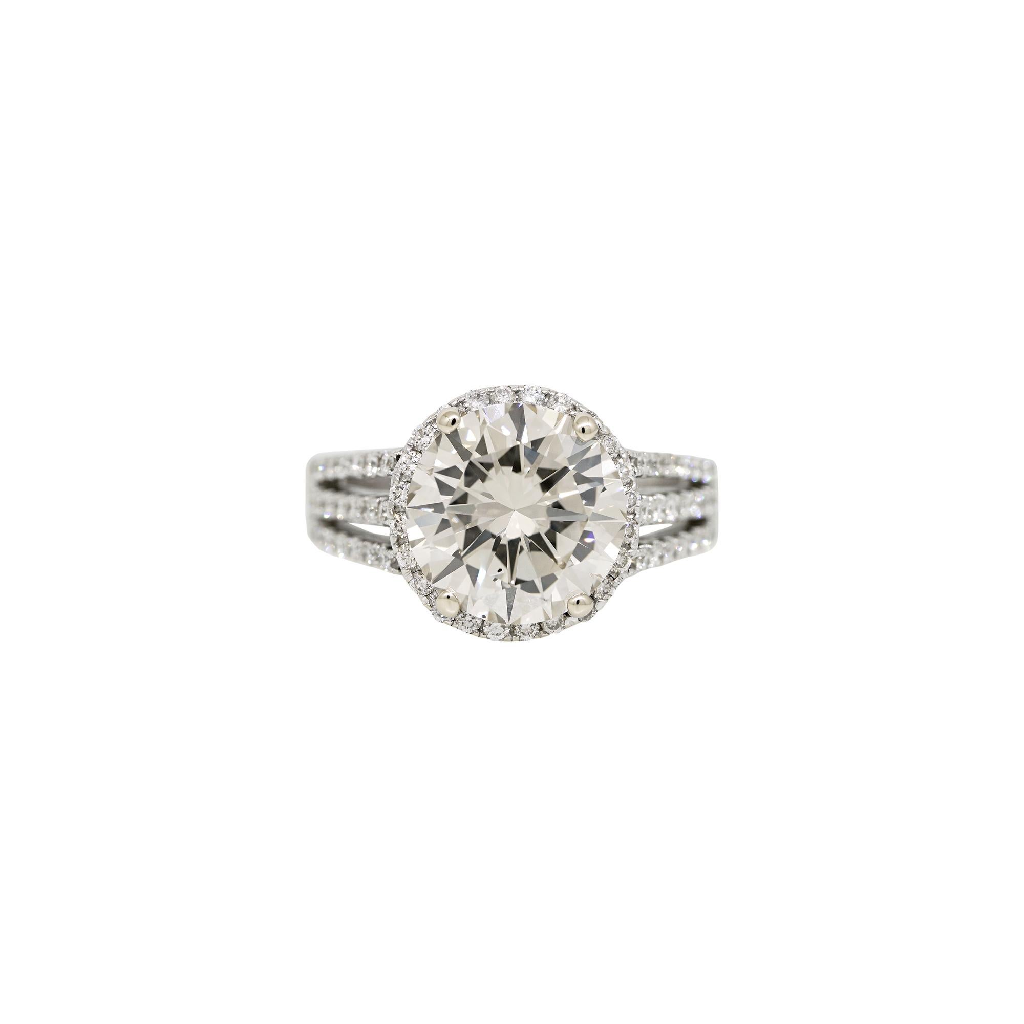 GIA 18k White Gold Natural 4.49 Carat Round Brilliant Diamond Engagement Ring

This exquisite GIA 18k White Gold Natural 4.49-carat Round Brilliant Diamond Engagement Ring combines timeless elegance with exceptional craftsmanship, making it a