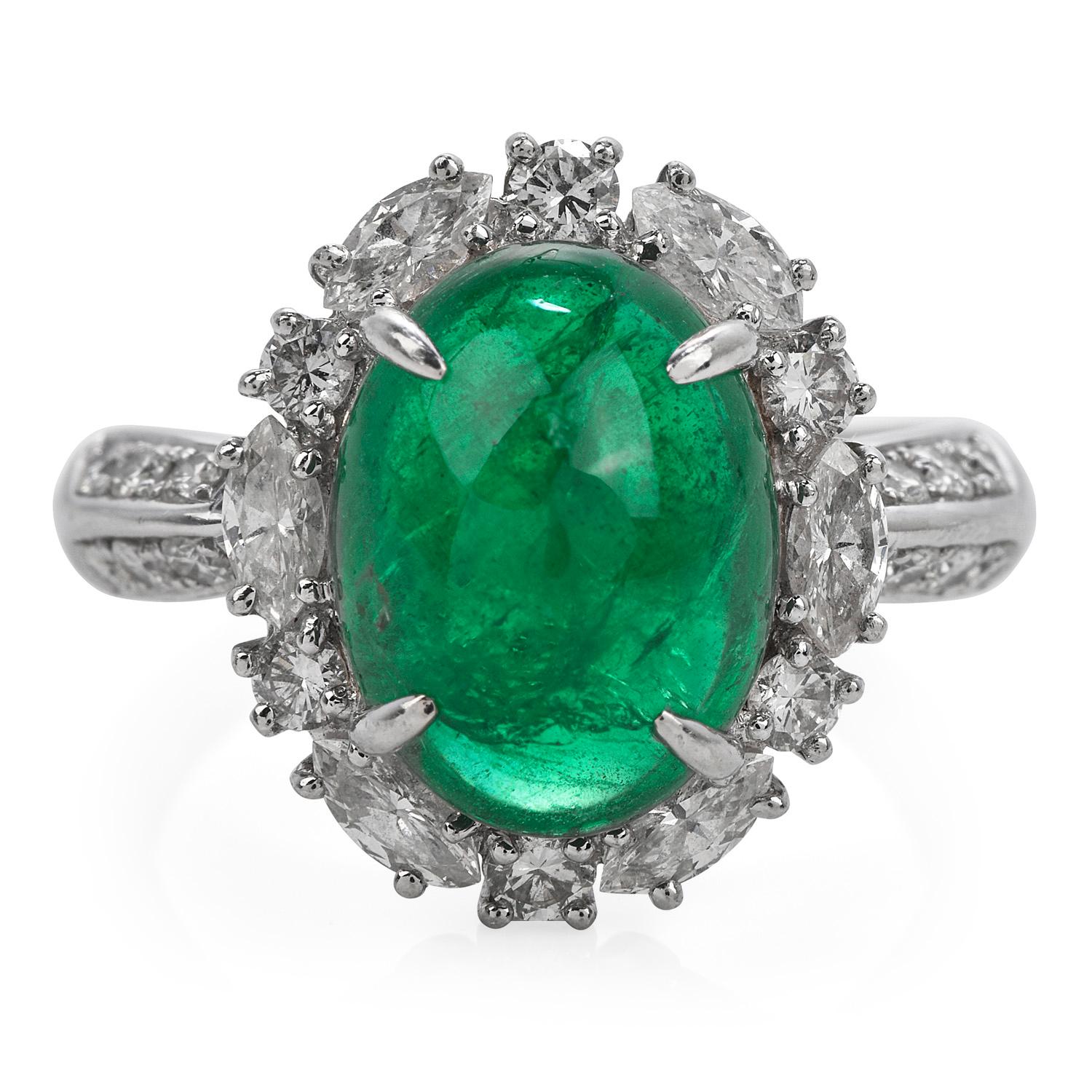 This exquisite GIA Genuine Emerald & Diamond Cocktail Ring is expertly crafted in solid platinum with a total weight of 9.54 grams.

The emerald with a weight of approx. 5.17 carats are surrounded by (6) round cut and (6) marquise cut genuine