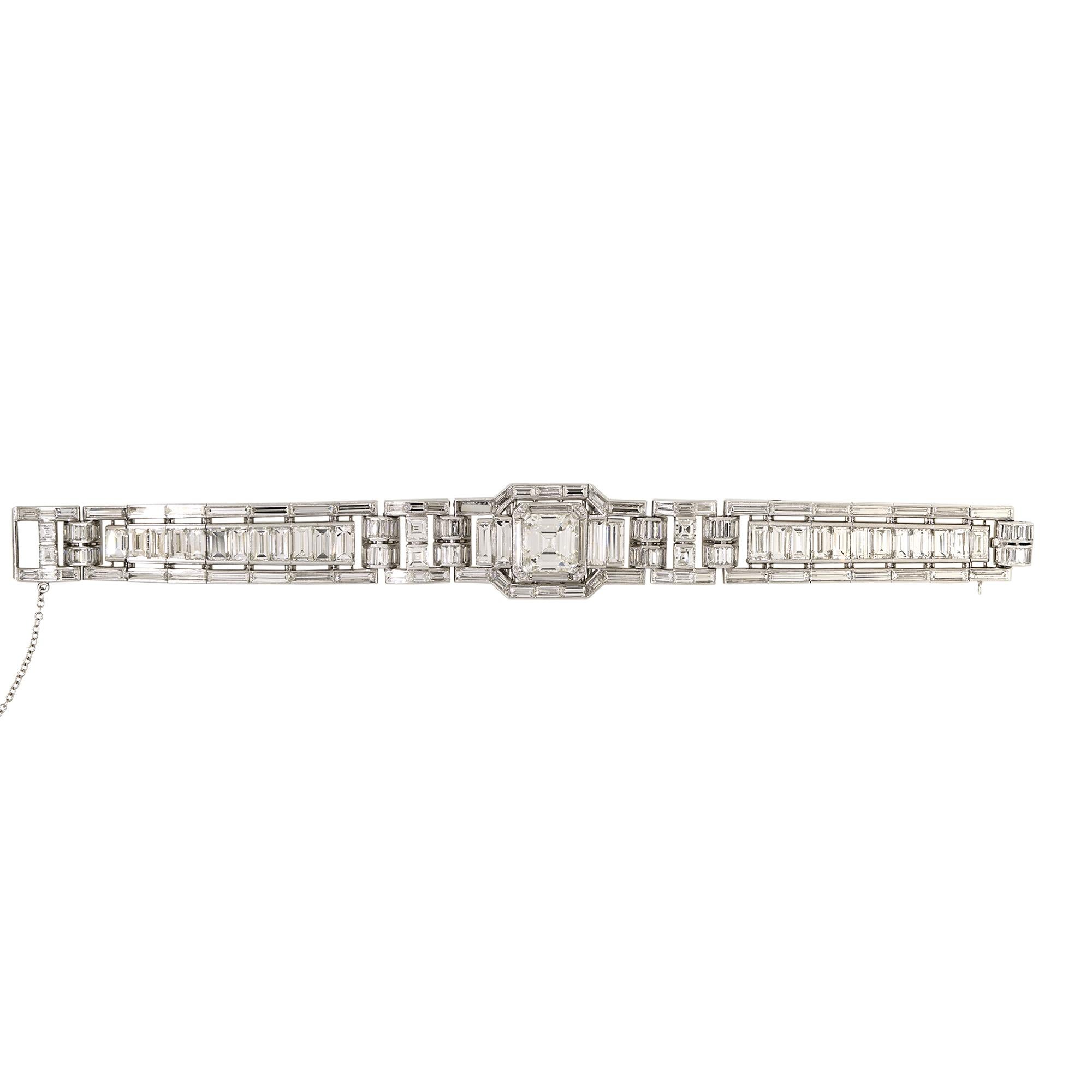 GIA Platinum Natural Emerald Cut & Multi-Shape Diamond Art-Deco Style Bracelet

This bracelet is truly one-of-a-kind and absolutely exceptional to look at. 

Style: Emerald Cut Art-Deco Style Wide Bracelet
Material: Platinum
Main Diamond Details: